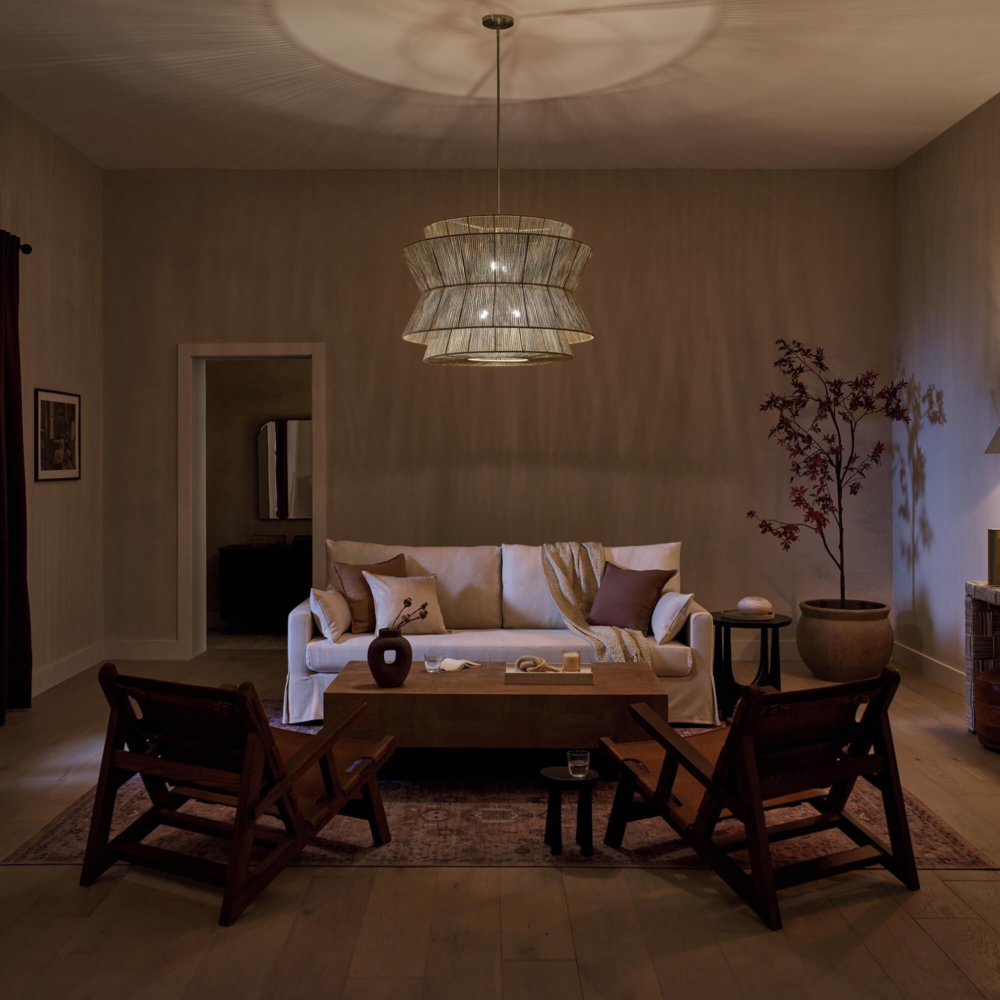 Shown in Champagne Bronze finish and Natural Fibers Textured shade