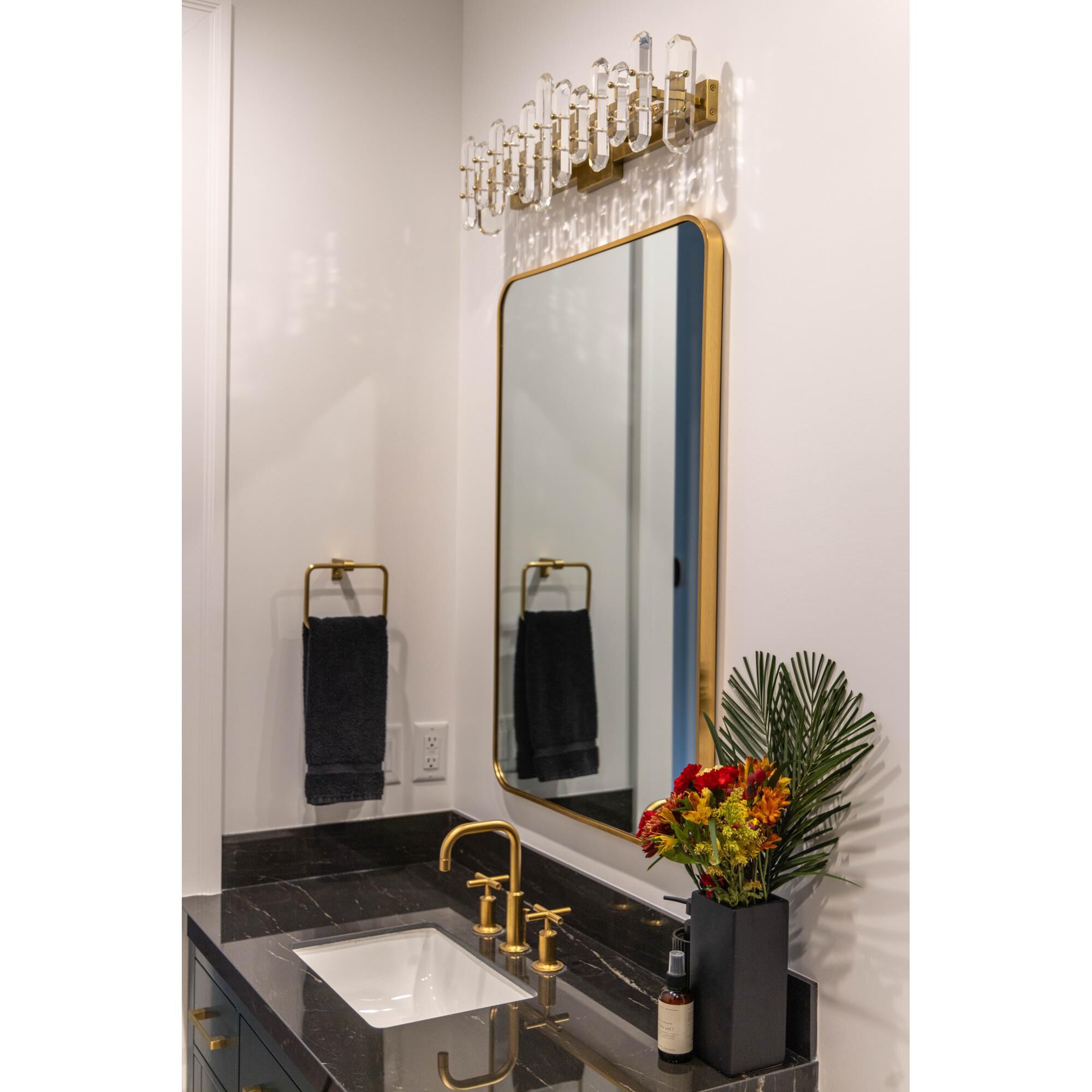 Shown in Aged Brass finish and Faceted Crystal Elements crystal