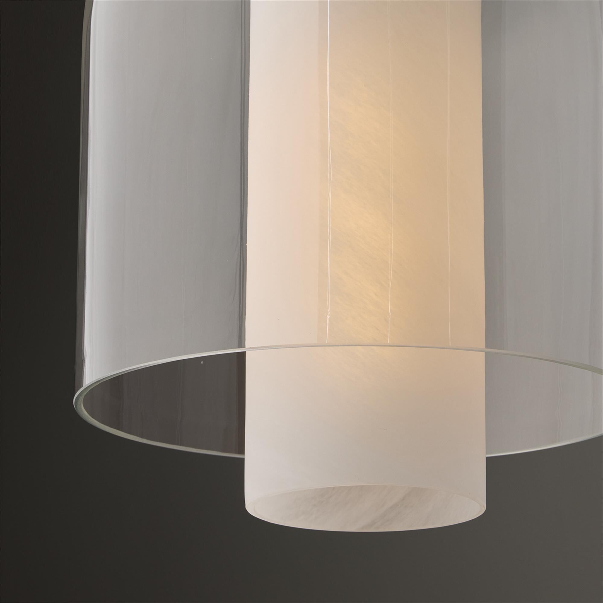 Shown in Aged Brass finish and Clear And Faux Alabaster glass
