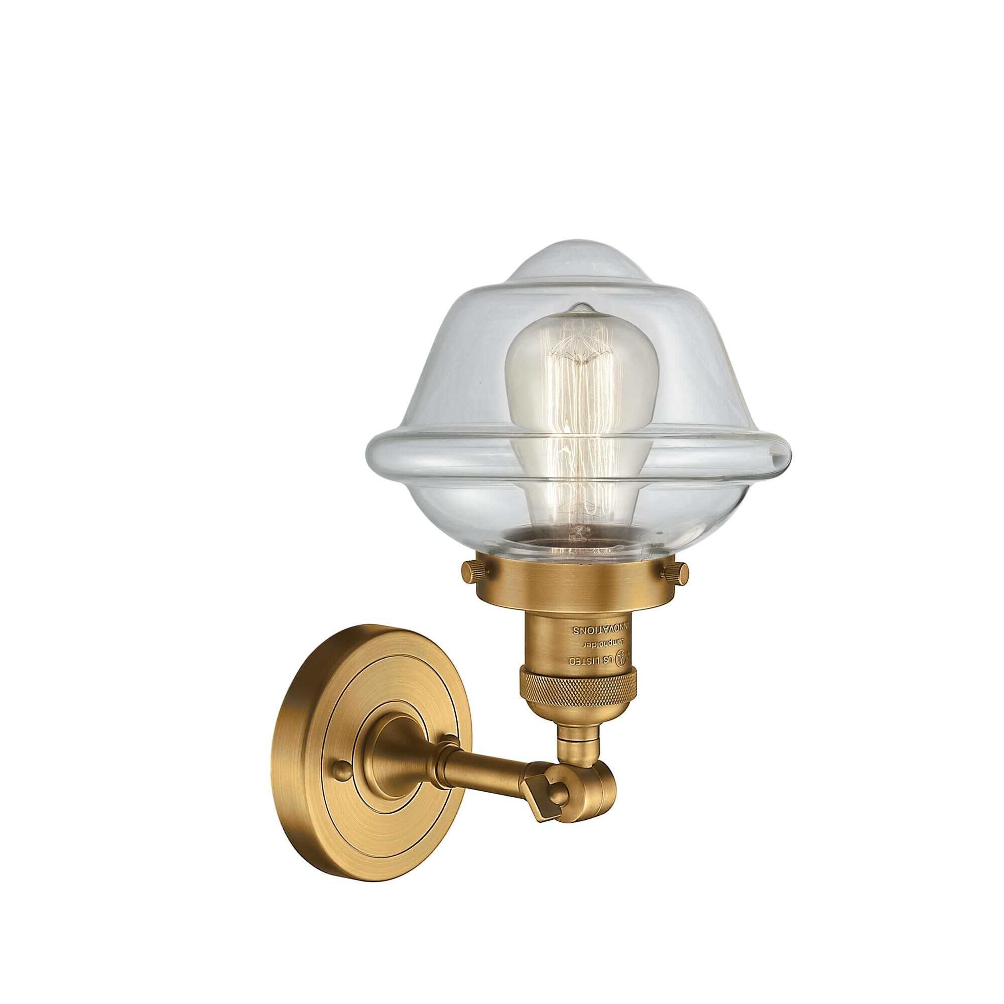 Shown in Brushed Brass finish and Clear glass