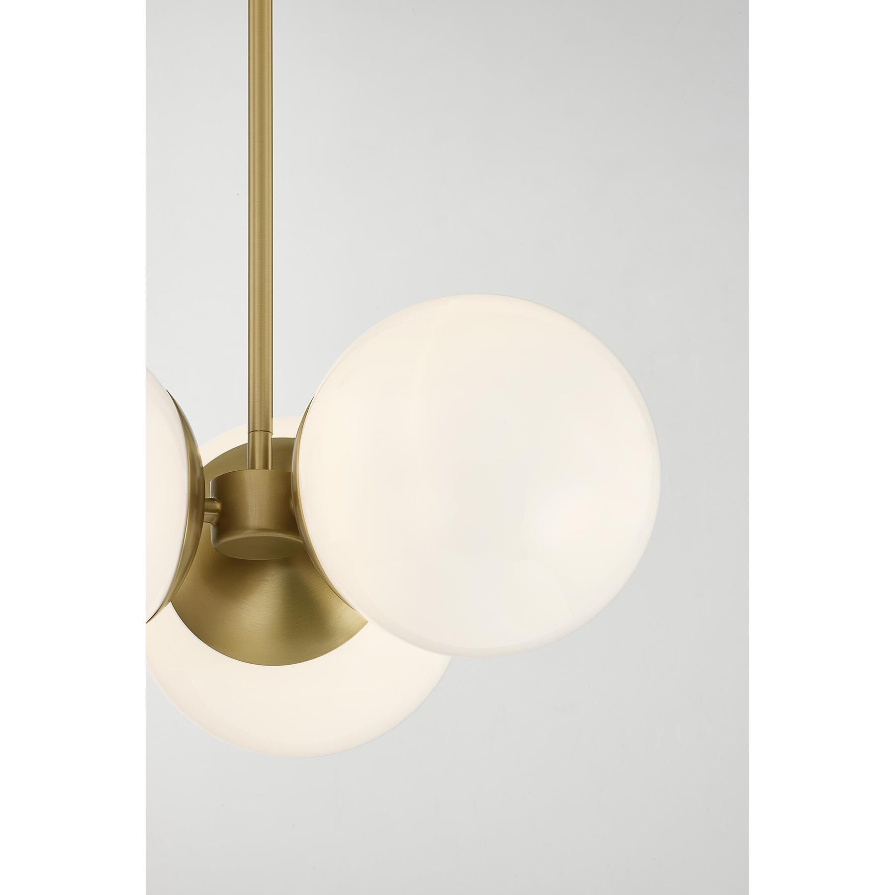 Shown in Warm Brass finish and White Opal glass