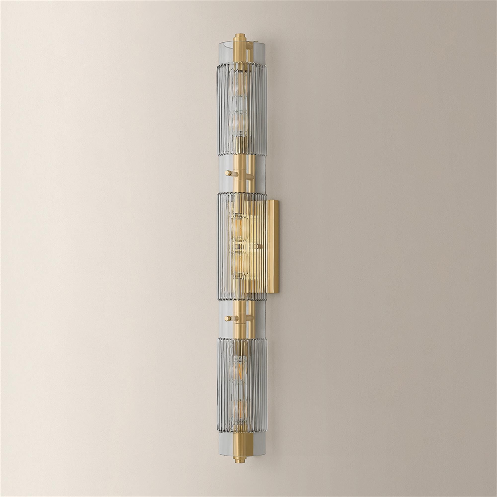 Shown in Vintage Brass finish and Clear Smoke glass