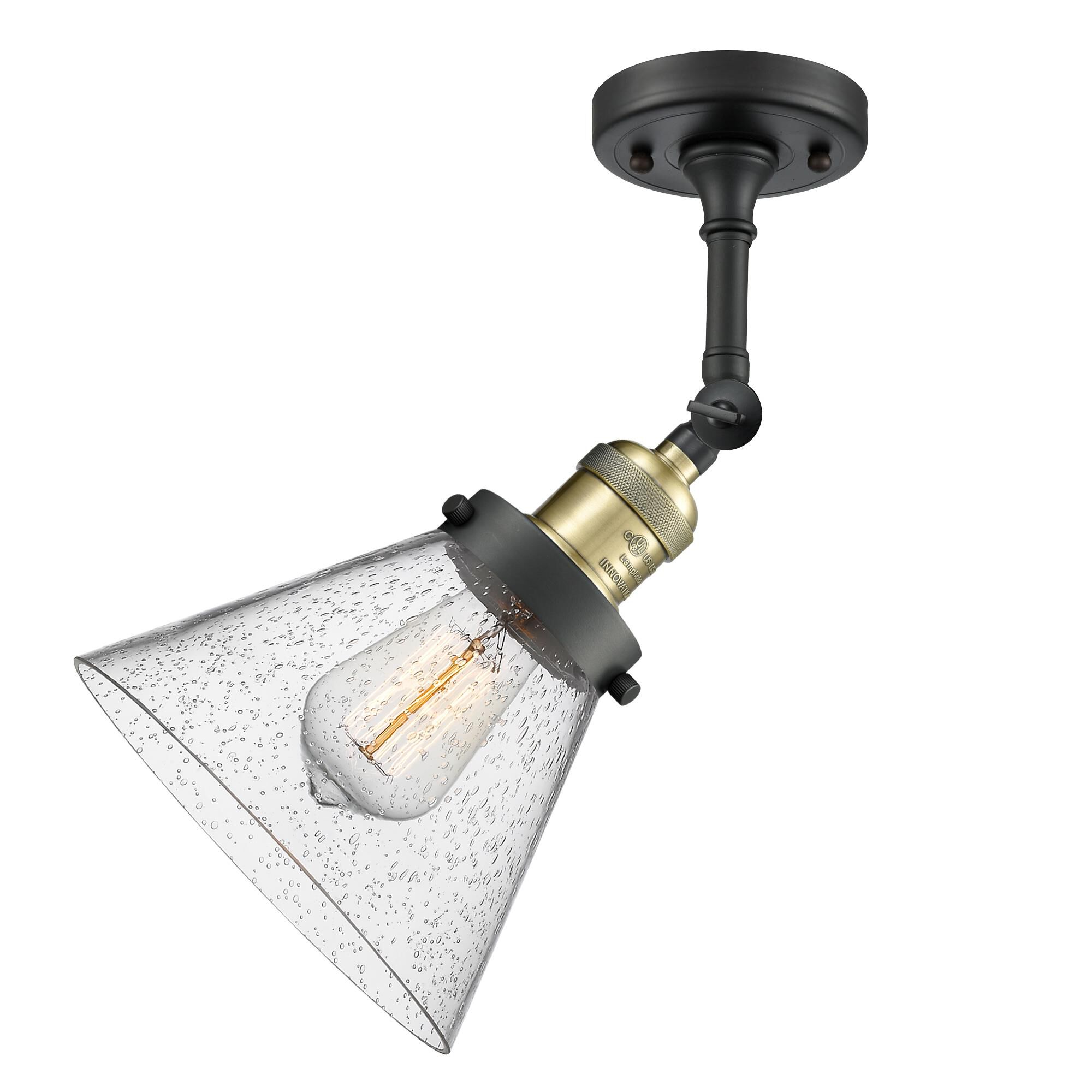 Shown in Black Antique Brass finish and Seedy glass and Brushed Satin Nickel shade and No Accent accent