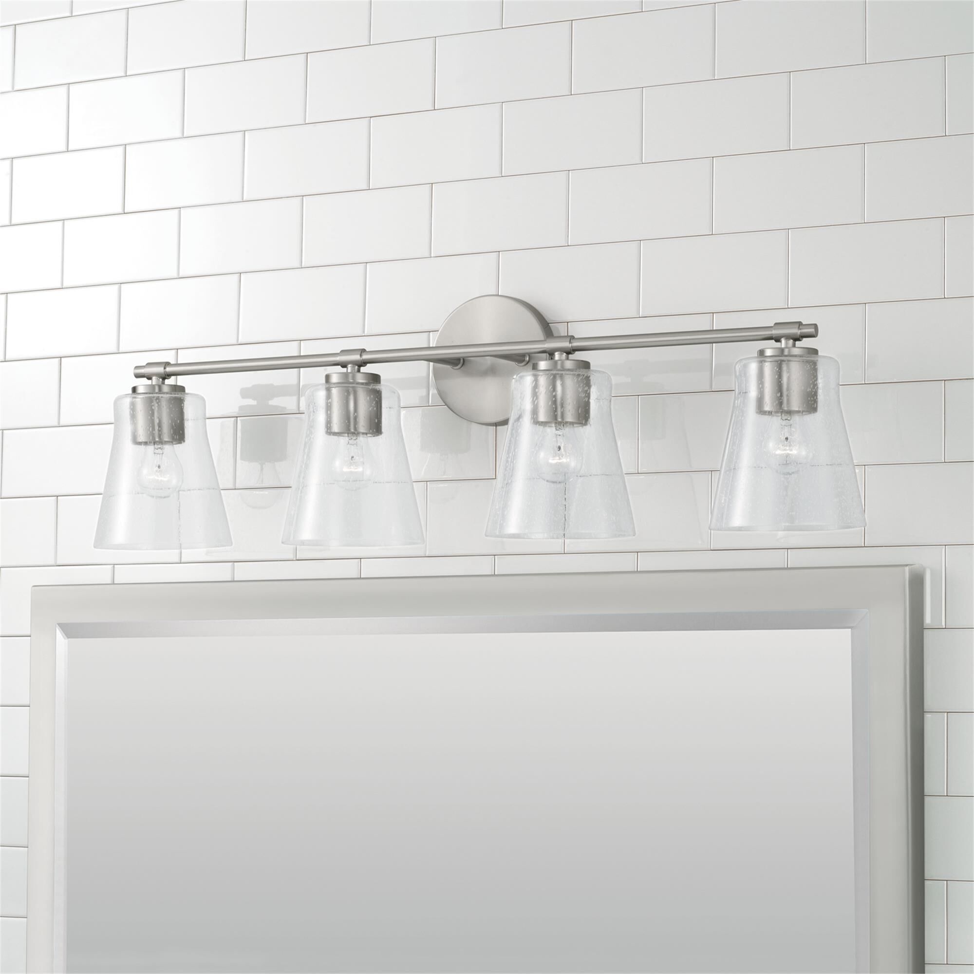 Shown in Brushed Nickel finish and Clear Seeded glass