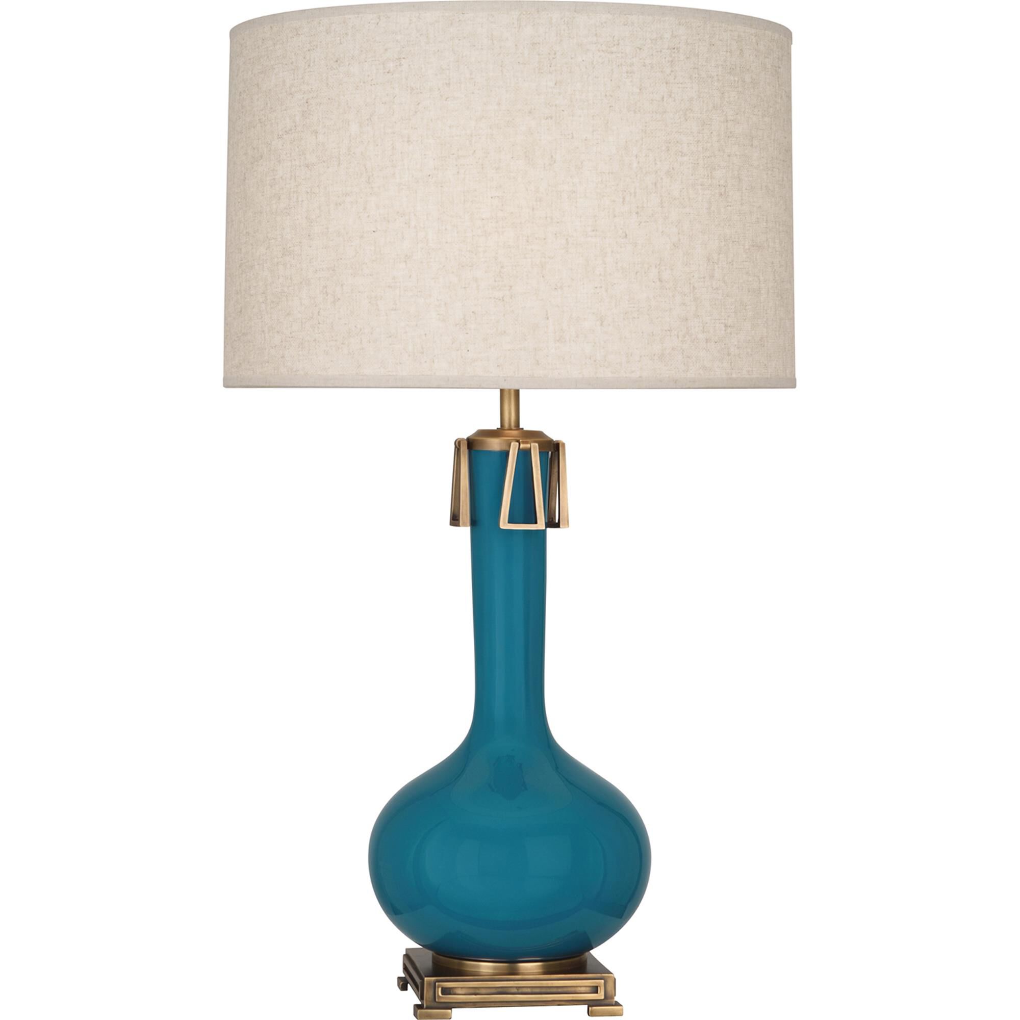 Shown in Peacock Glazed Ceramic With Aged Brass Accents finish and Open Weave Heather Linen shade