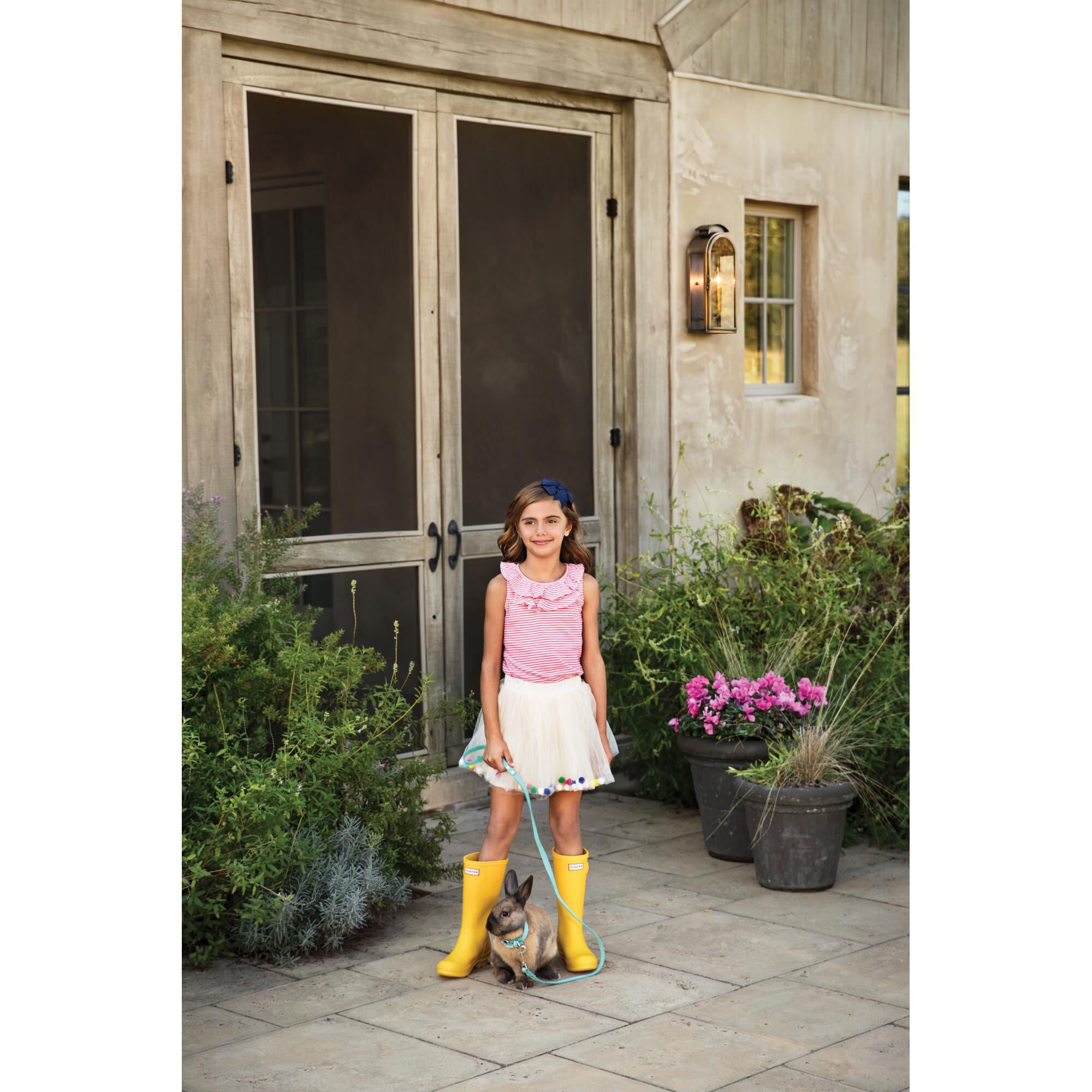 Shown in Light Antique Brass finish and Clear glass