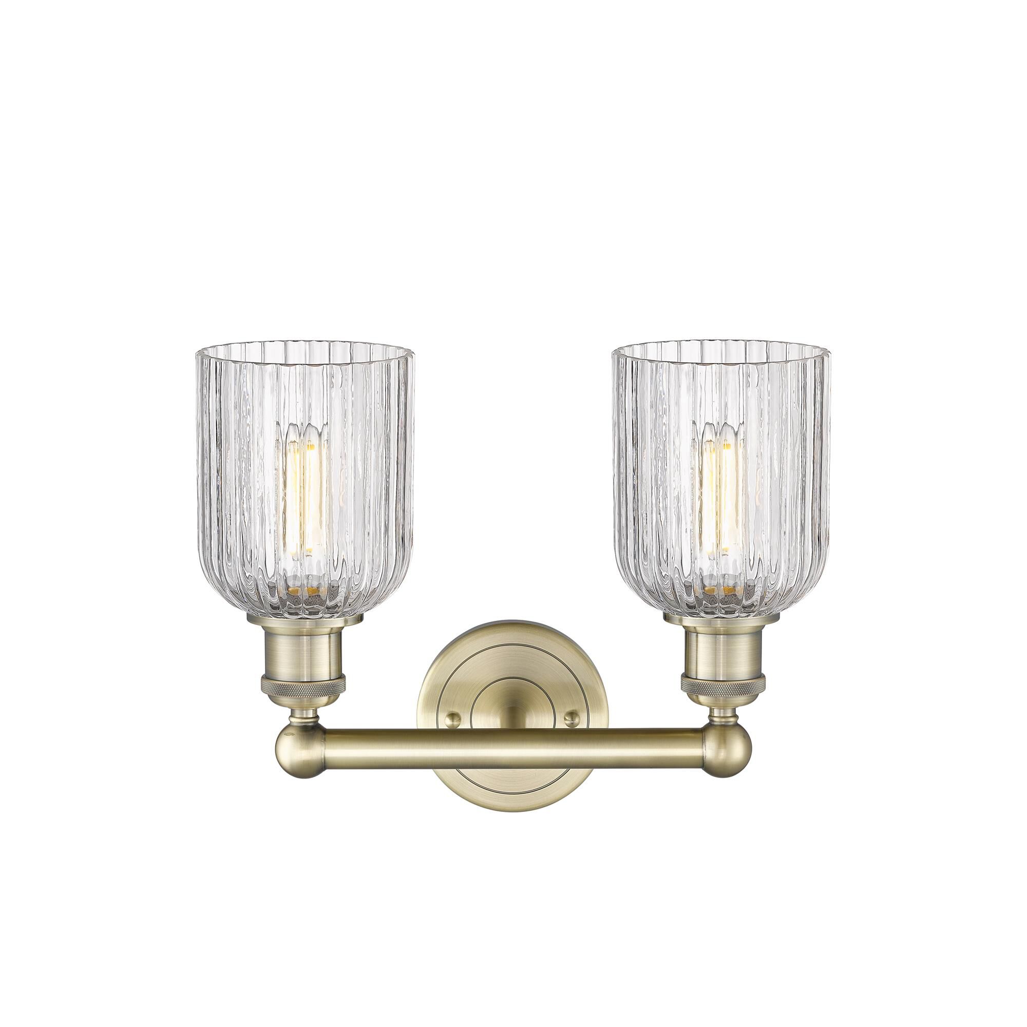 Shown in Antique Brass finish and Clear glass