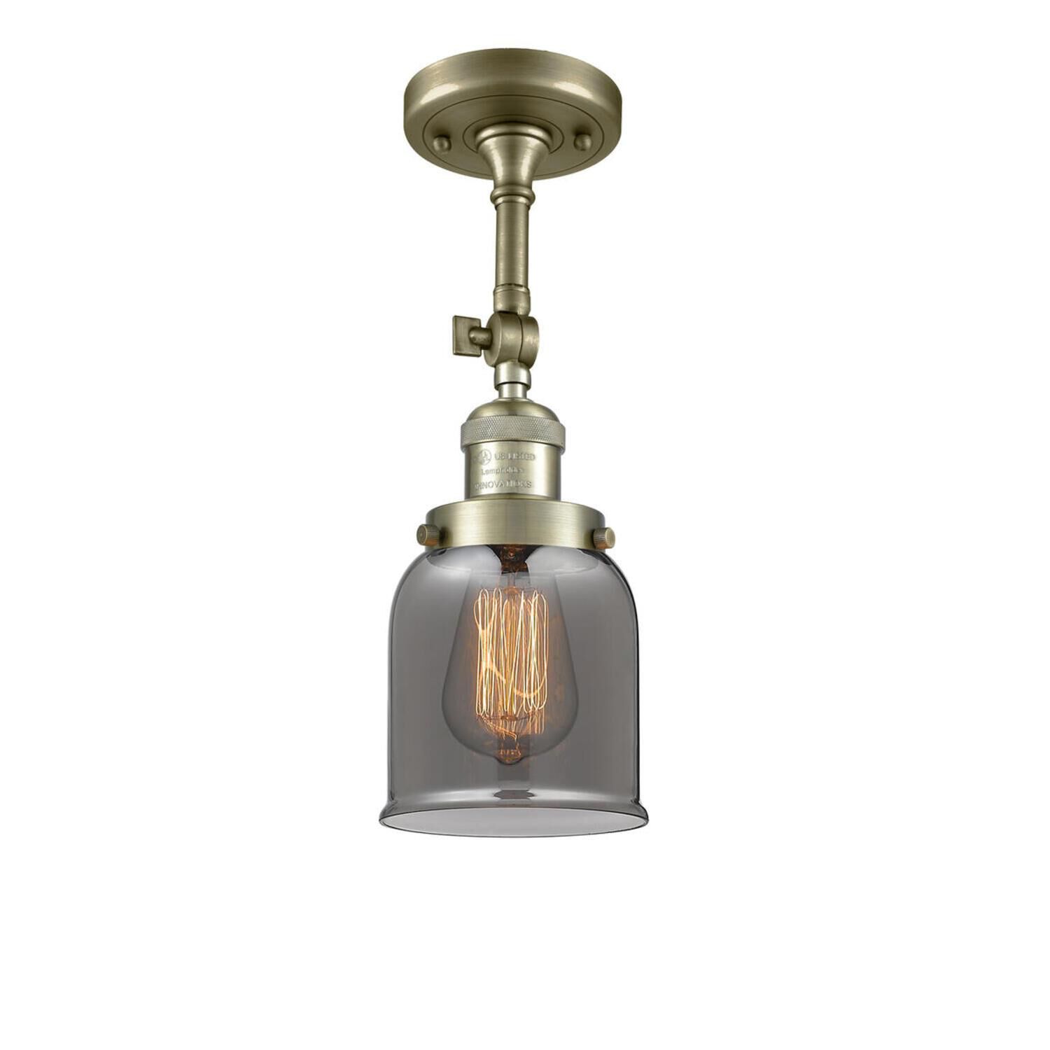 Shown in Antique Brass finish and Plated Smoked glass and None accent