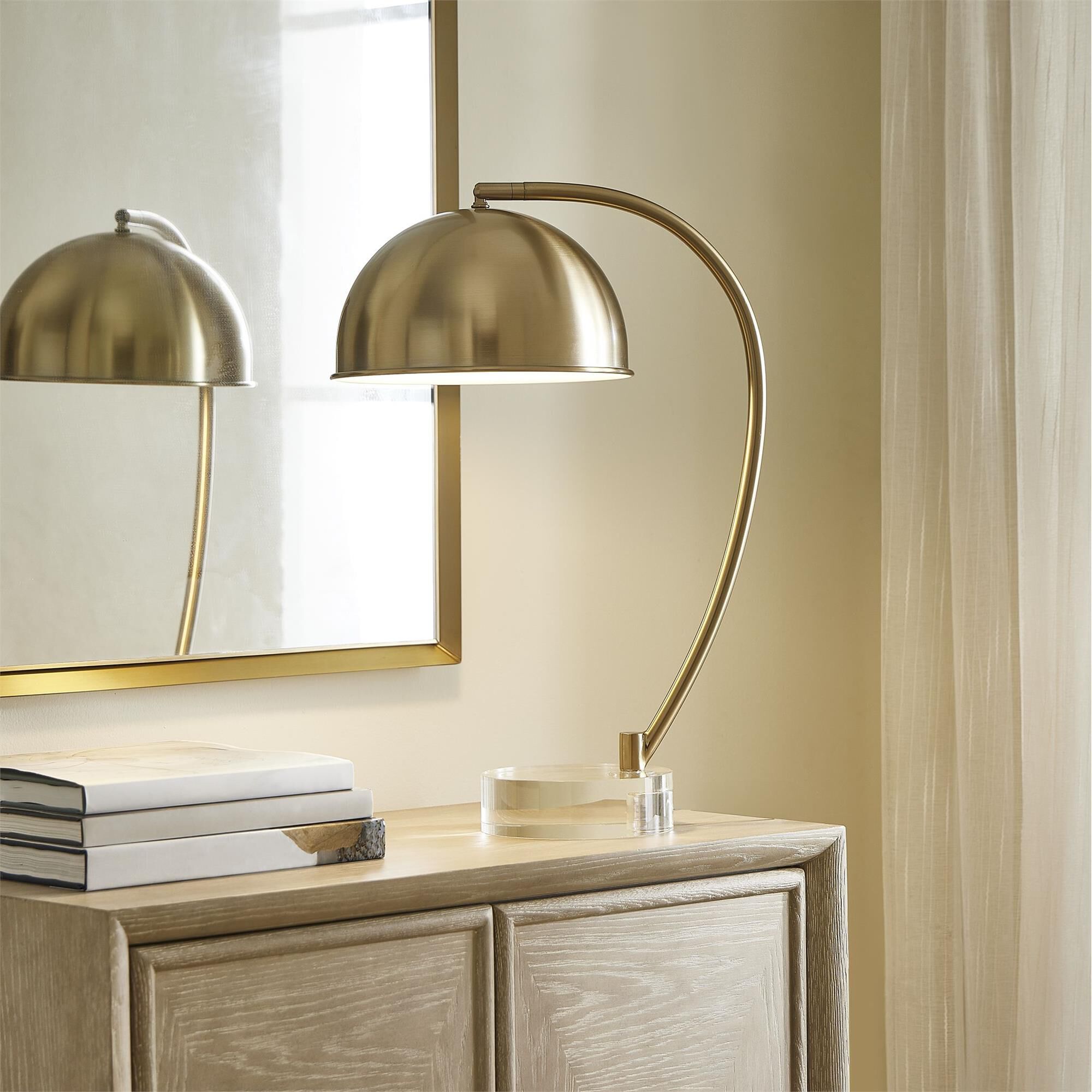 Shown in Brass and Gold finish and Round shade