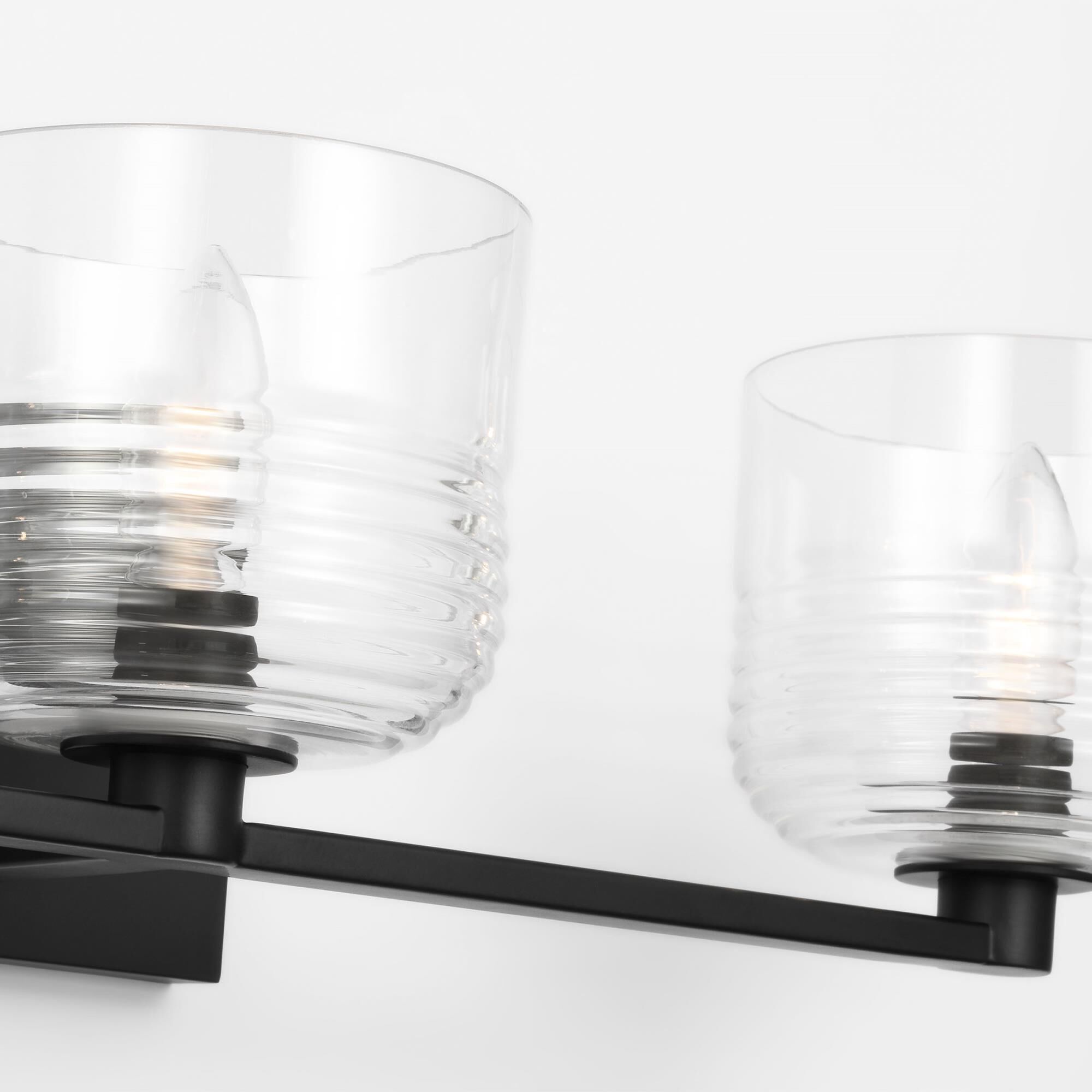 Shown in Midnight Black finish and Clear Ribbed glass