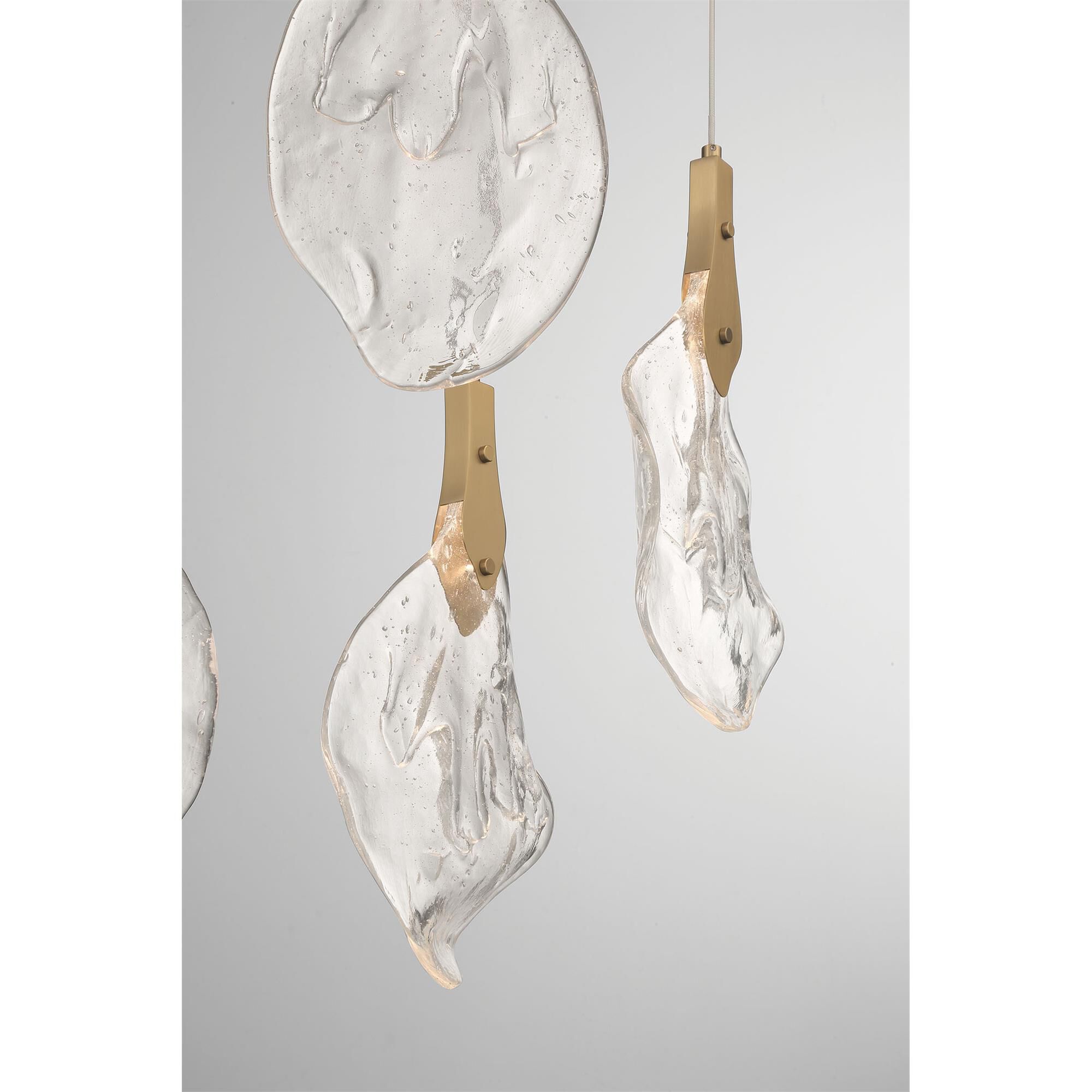Shown in Gold finish and Clear Organic glass