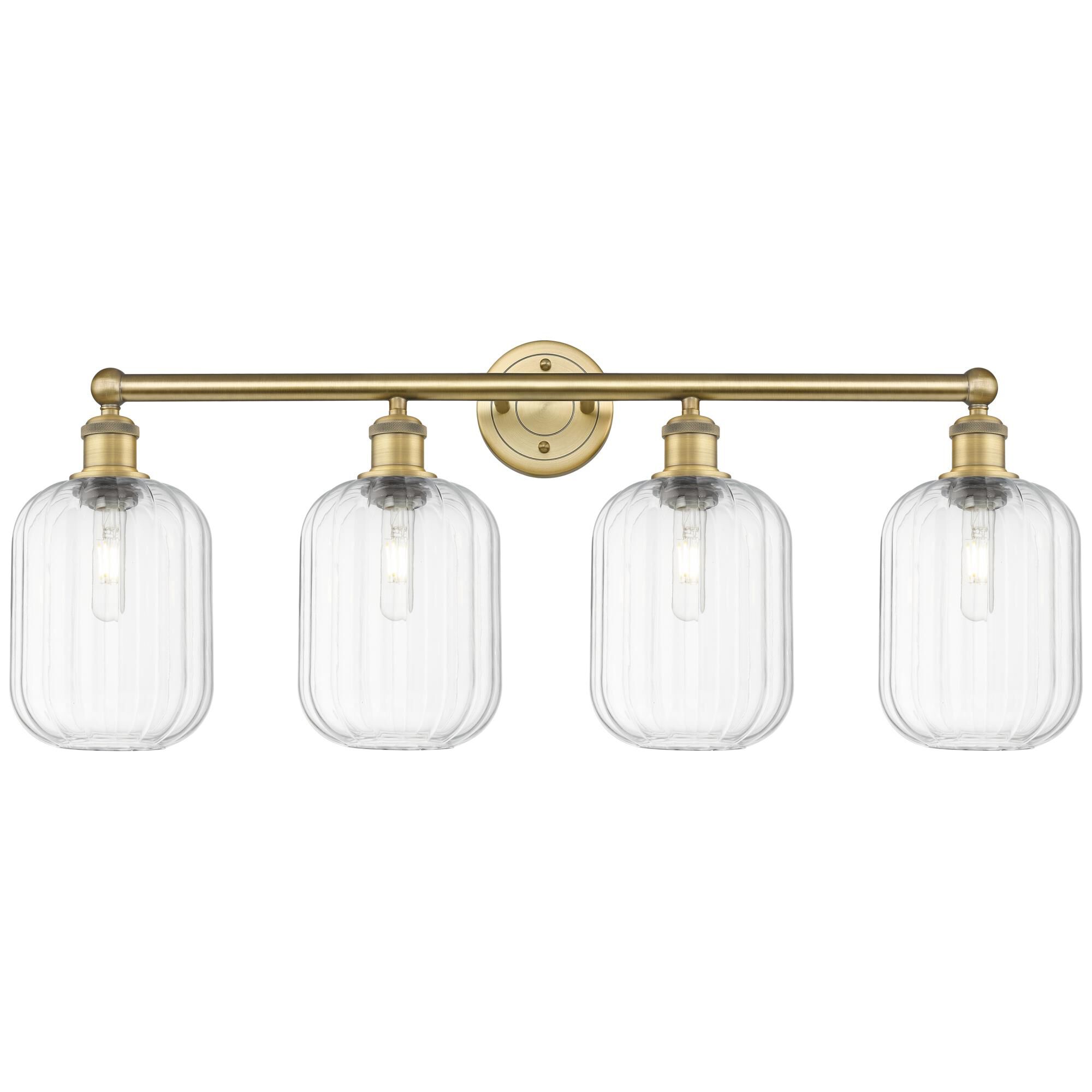 Shown in Brushed Brass finish and Clear glass