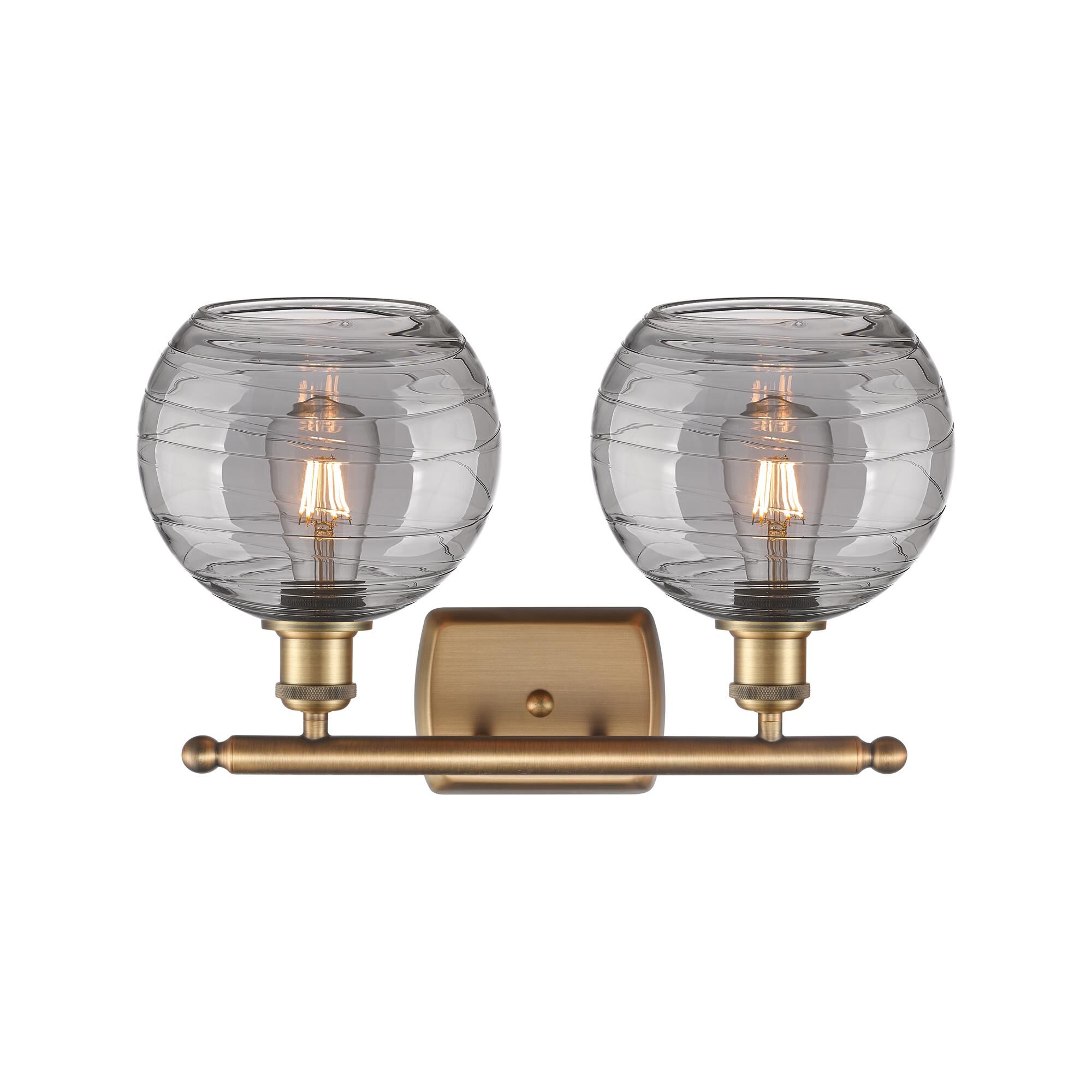 Shown in Brushed Brass finish and Light Smoke Deco Swirl glass
