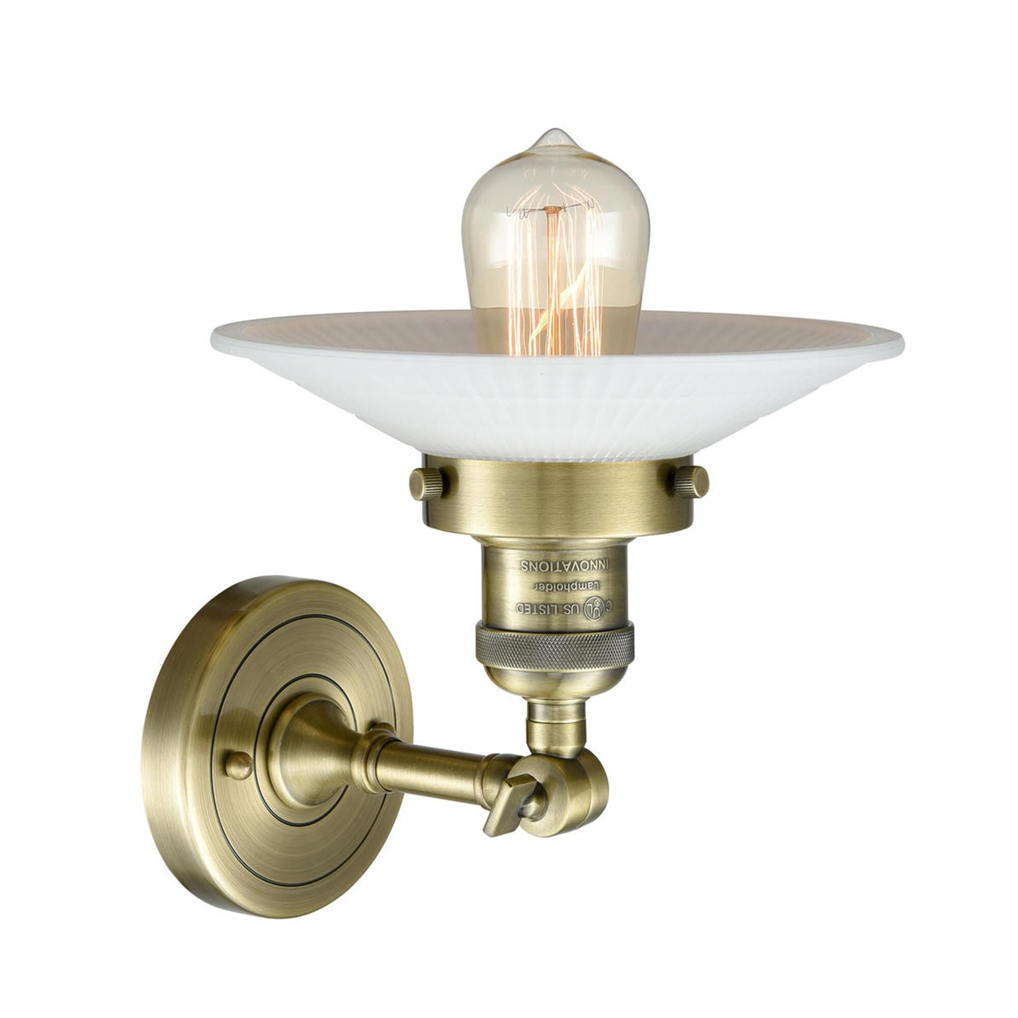 Shown in Antique Brass finish and Matte White Halophane - Cone glass