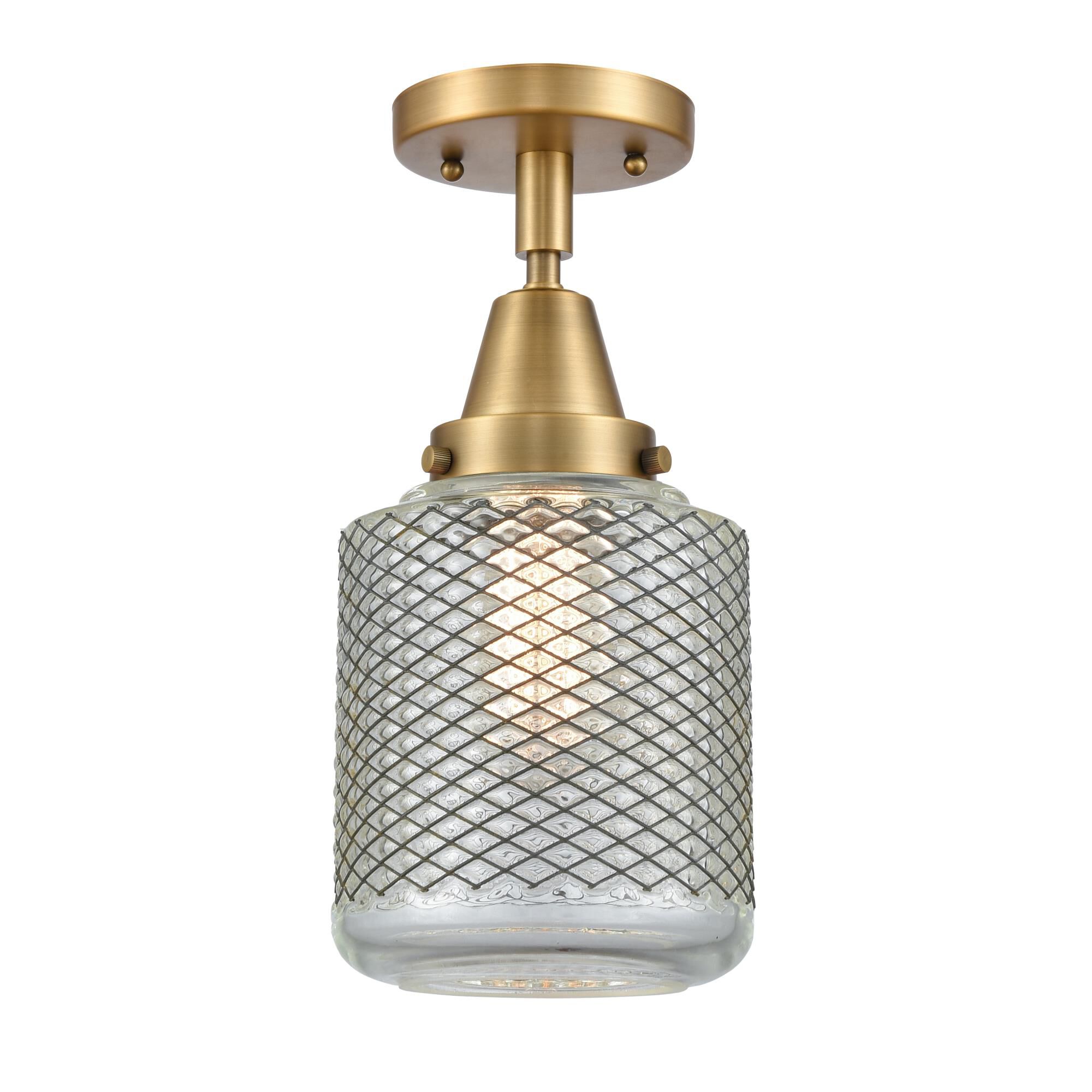 Shown in Brushed Brass finish and Vintage Wire Mesh Stanton glass