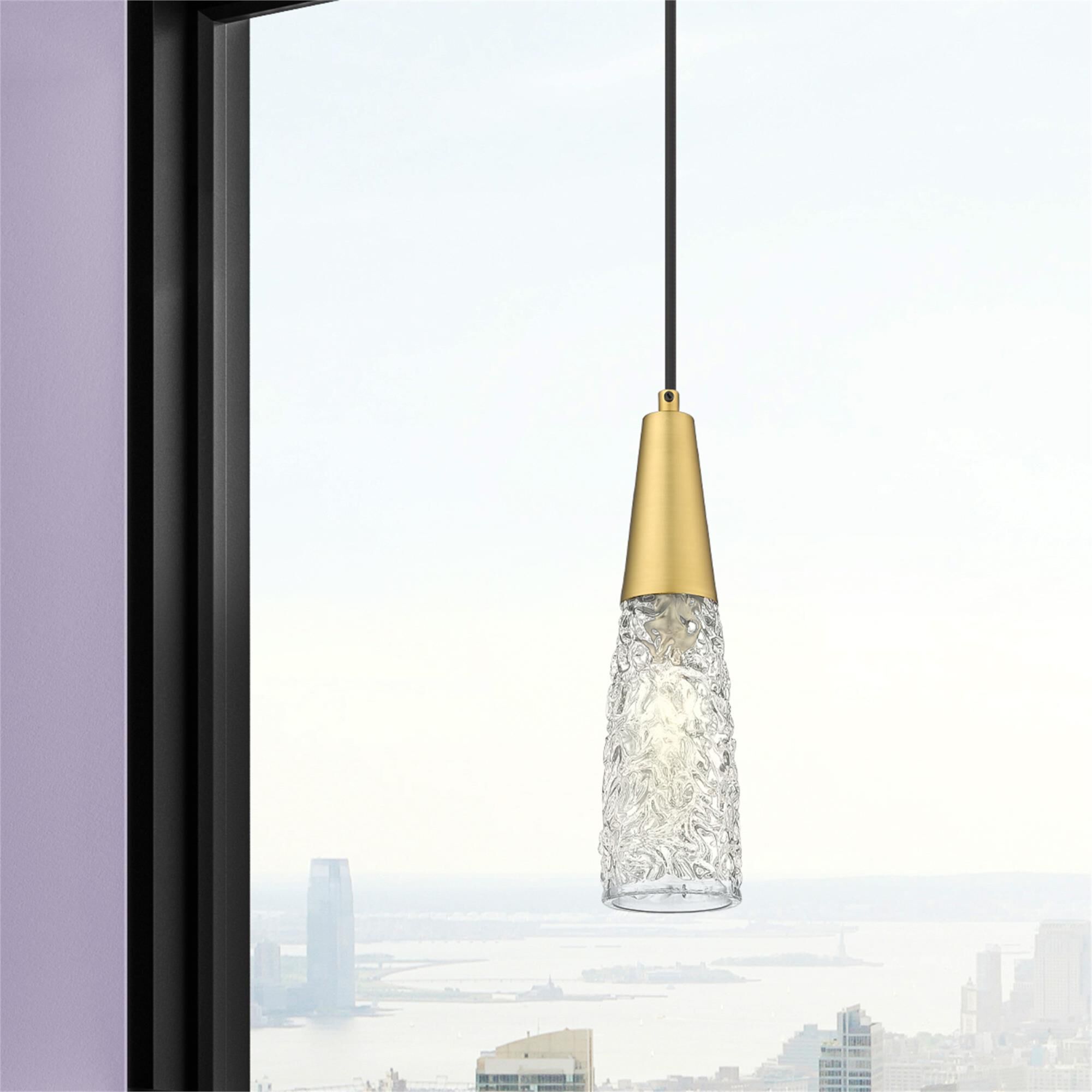 Shown in Brushed Brass finish and Clear shade