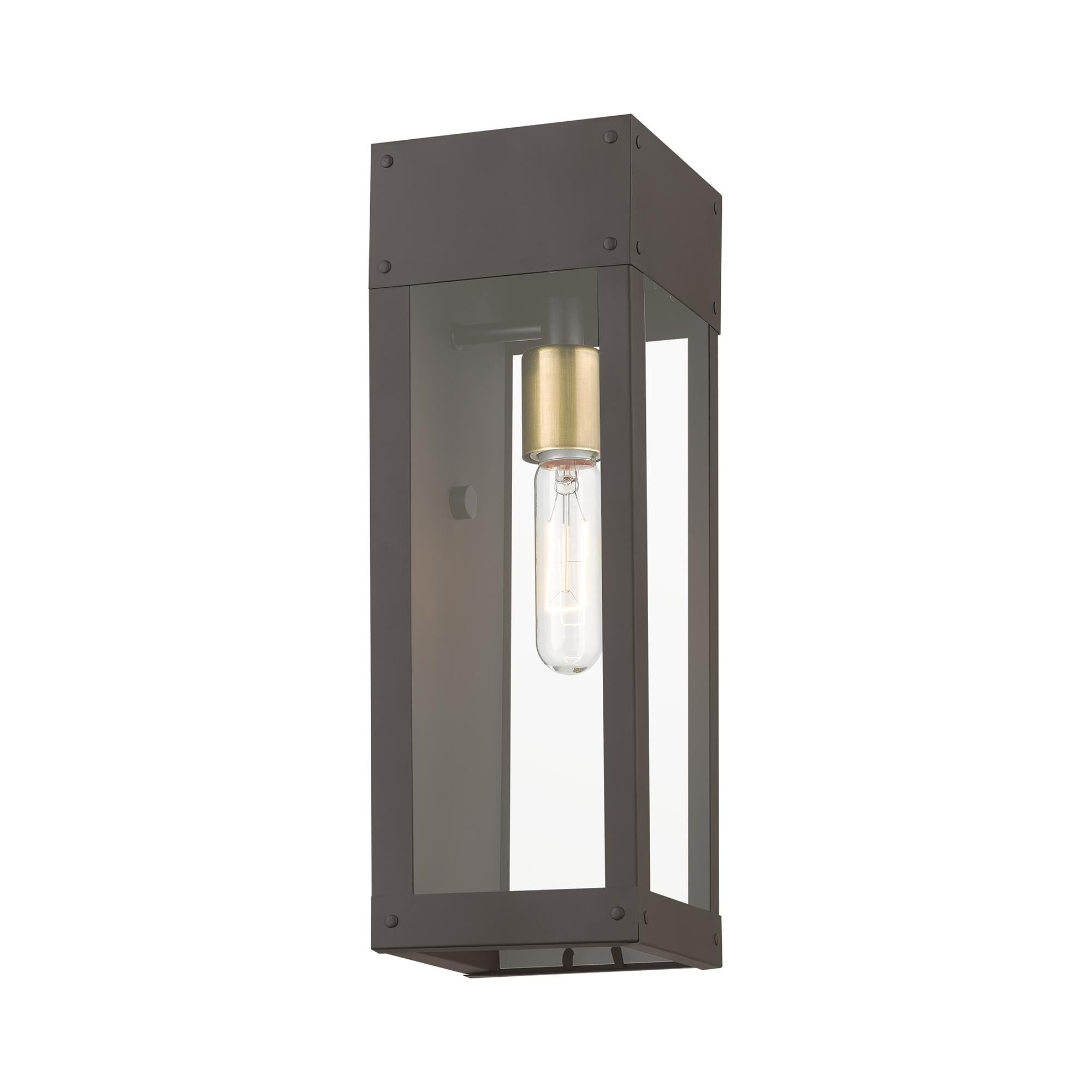 Shown in Bronze with Antique Brass Candle finish and Clear glass