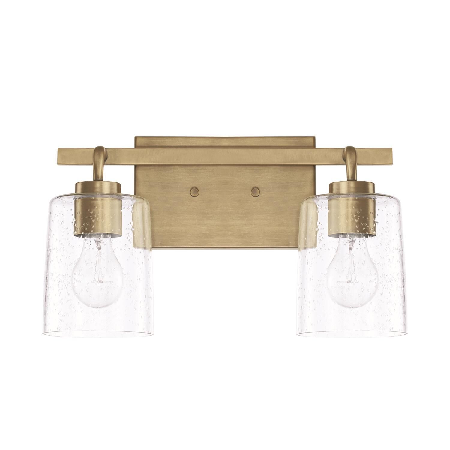 Shown in Aged Brass finish and Clear Seeded glass