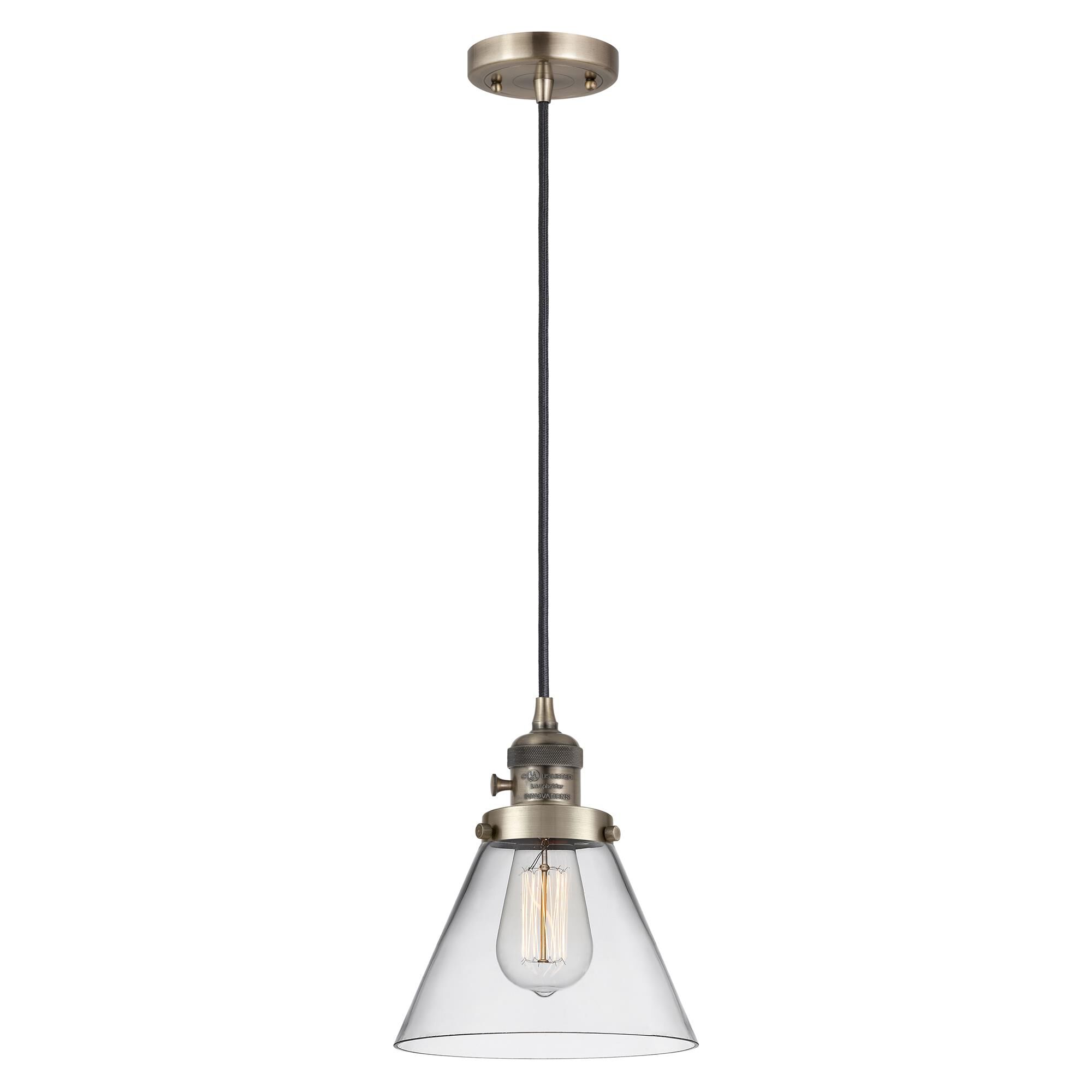 Shown in Antique Brass finish and Clear glass