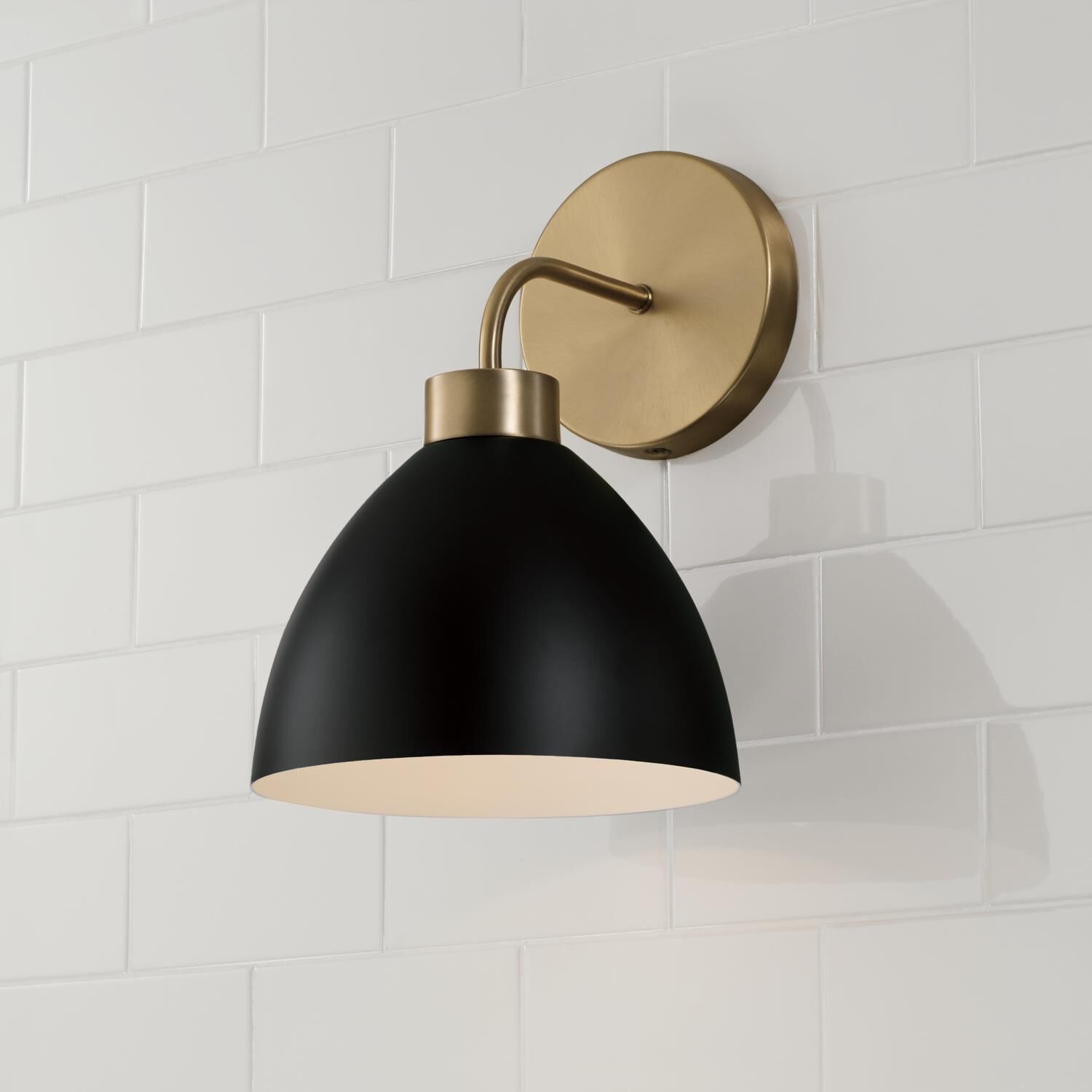 Shown in Aged Brass And Black finish and Matte Black Metal  With White Interior shade