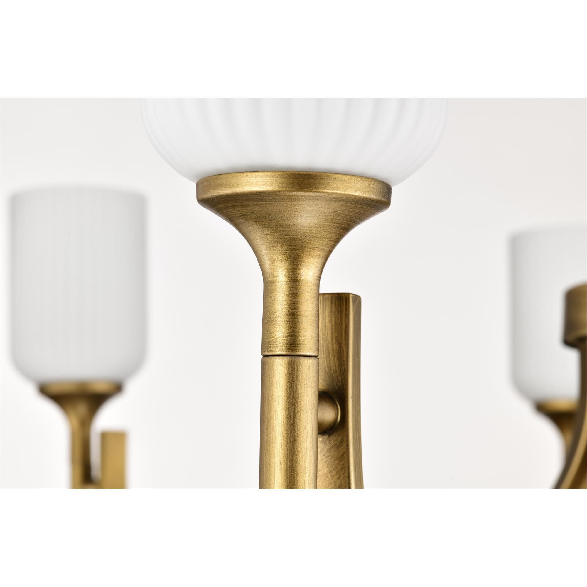 Shown in Natural Brass finish and Frosted Ribbed glass