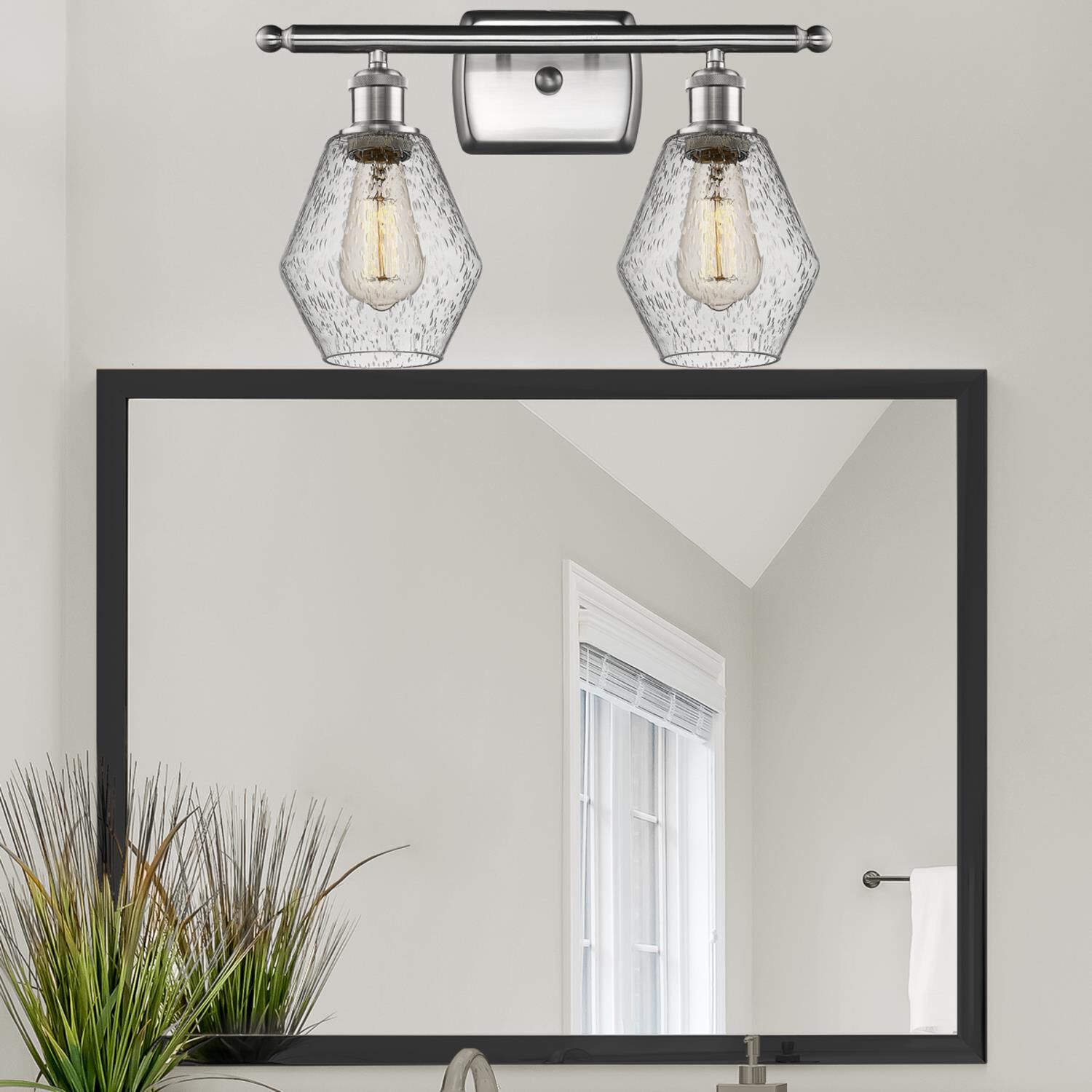 Shown in Brushed Satin Nickel  finish and Seedy glass