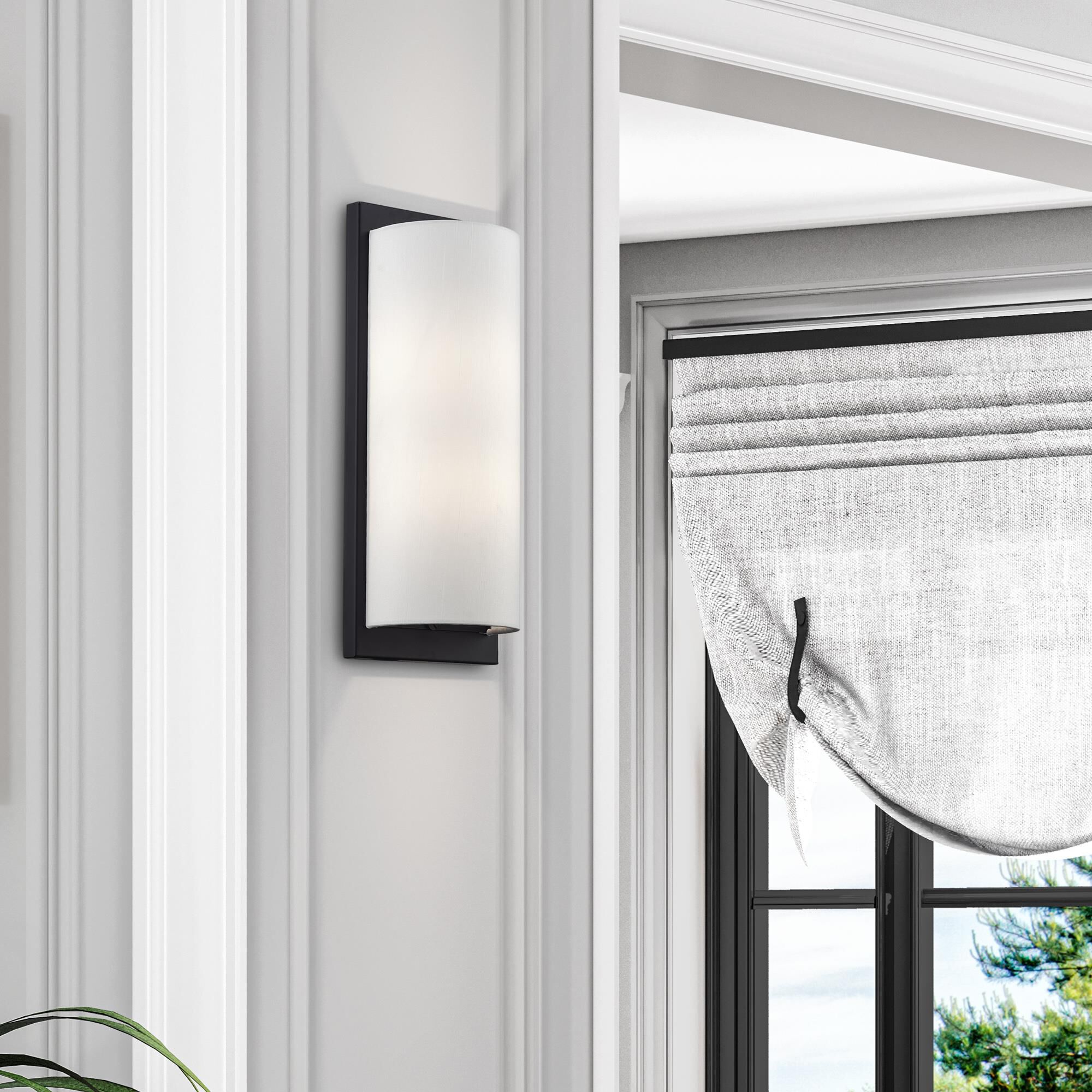 Shown in Black finish and Hand Crafted Off-White Fabric Hardback shade