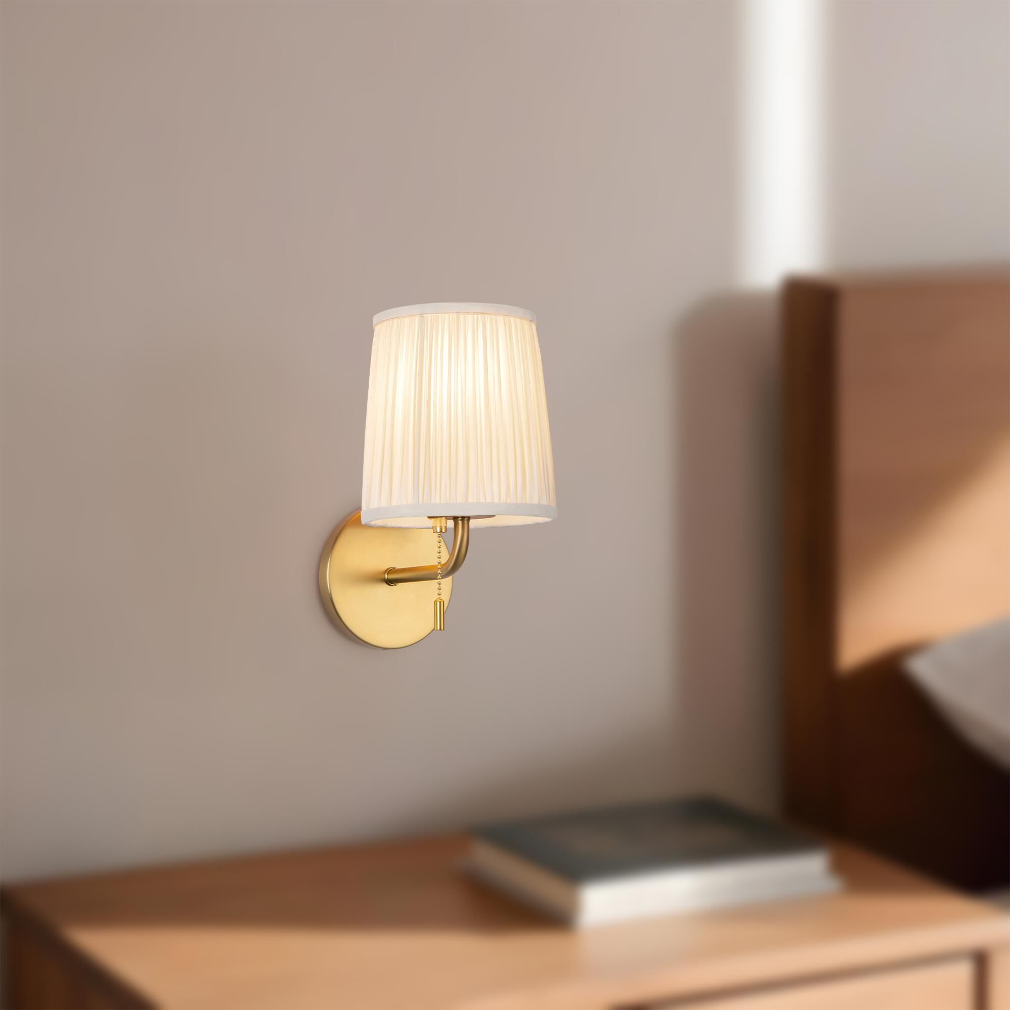 Shown in Brushed Gold finish and White Linen shade