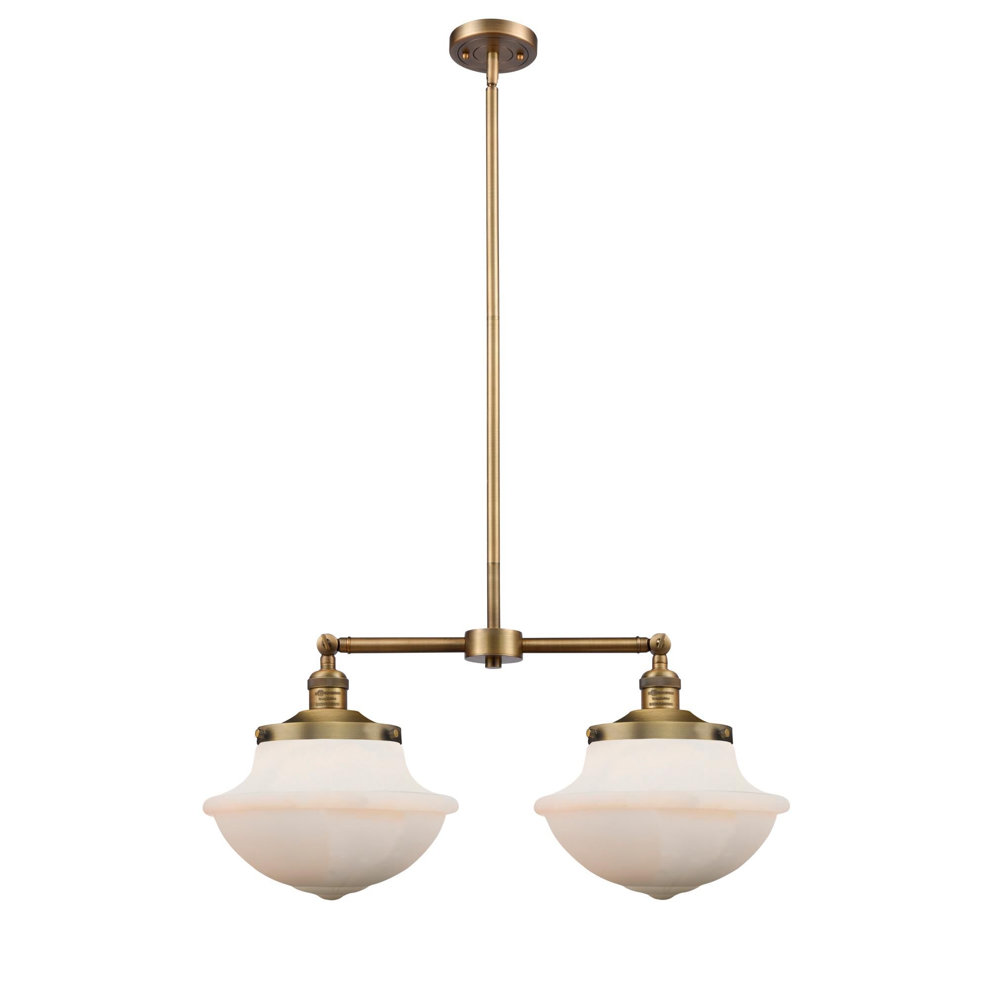 Shown in Brushed Brass finish and Matte White glass