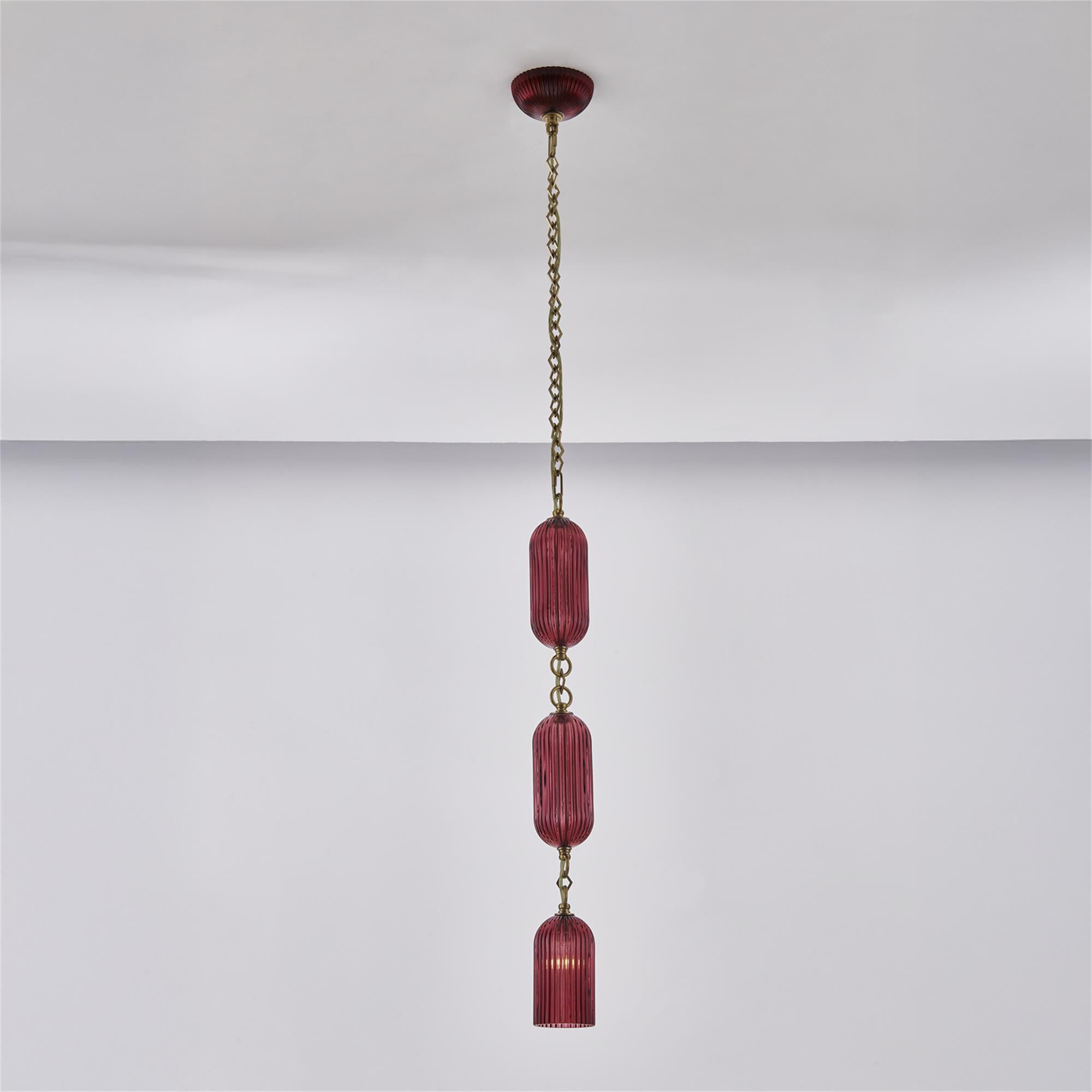 Shown in Satin Brass finish and Peacock Green glass