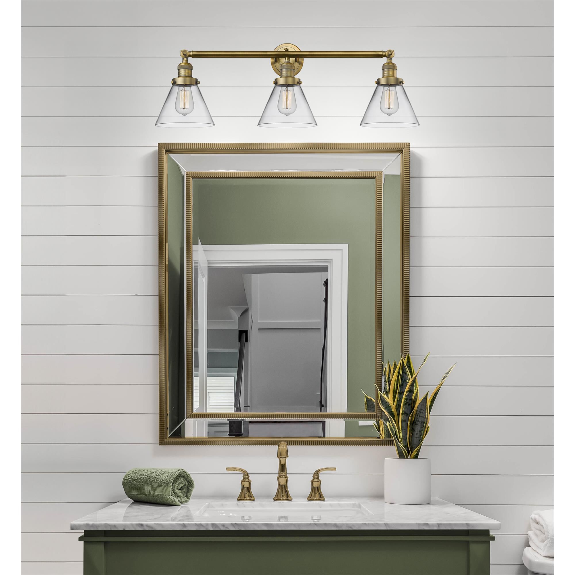 Shown in Brushed Brass finish and Clear glass