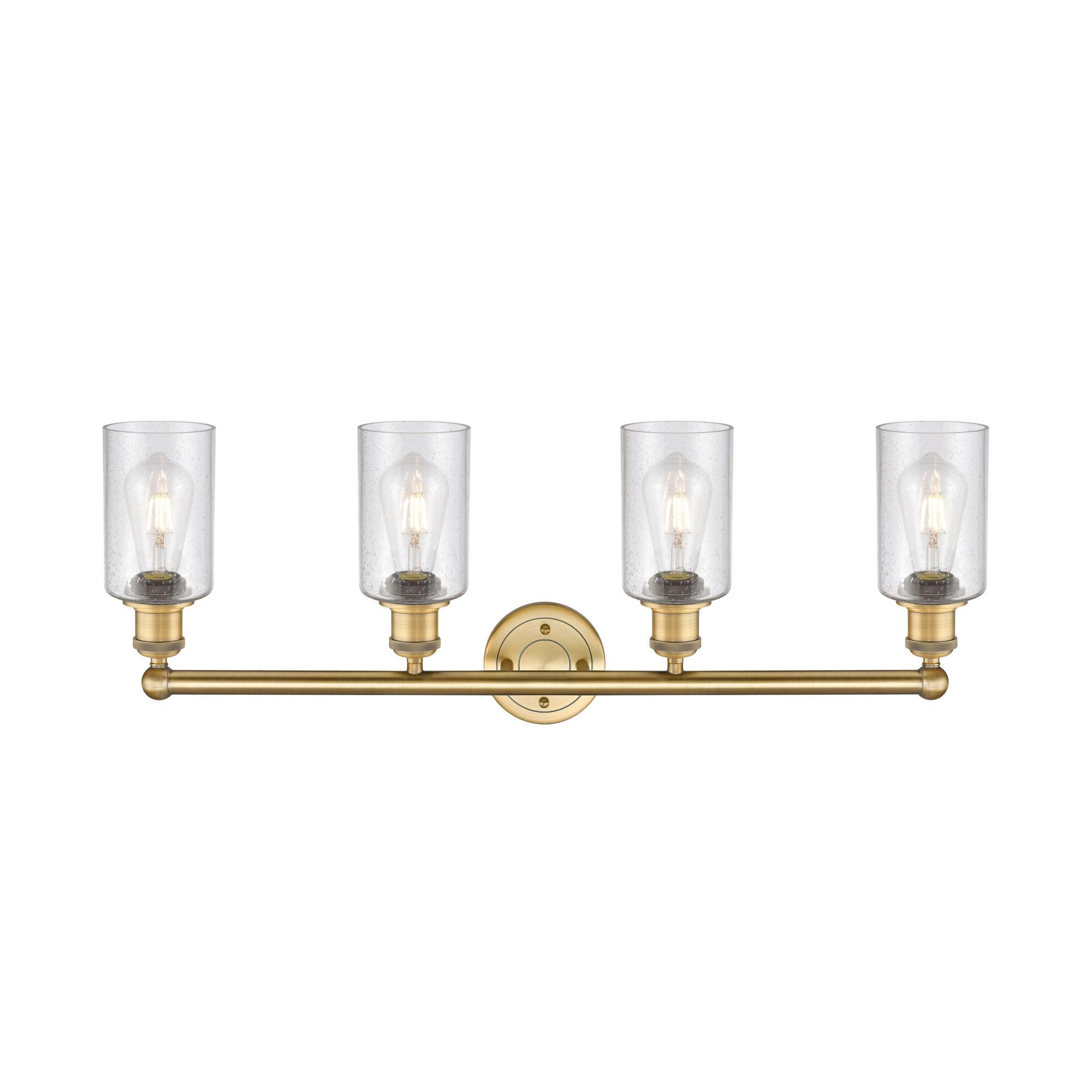 Shown in Brushed Brass finish and Seedy glass