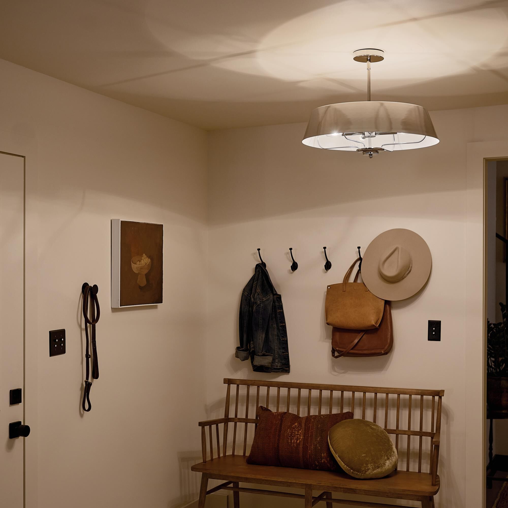 Shown in Polished Nickel finish and Metal shade