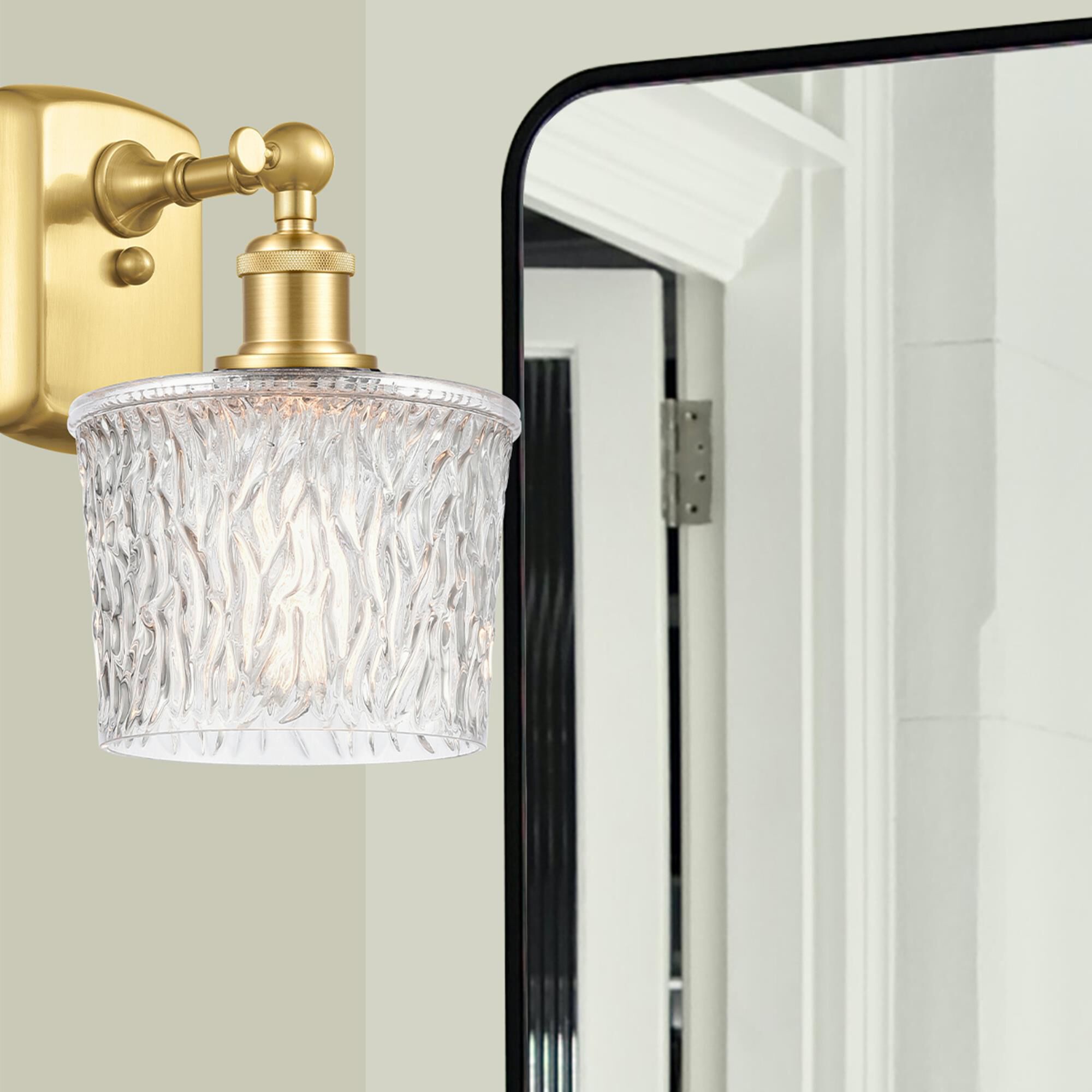 Shown in Satin Gold finish and Clear Niagra glass and Polished Chrome accent