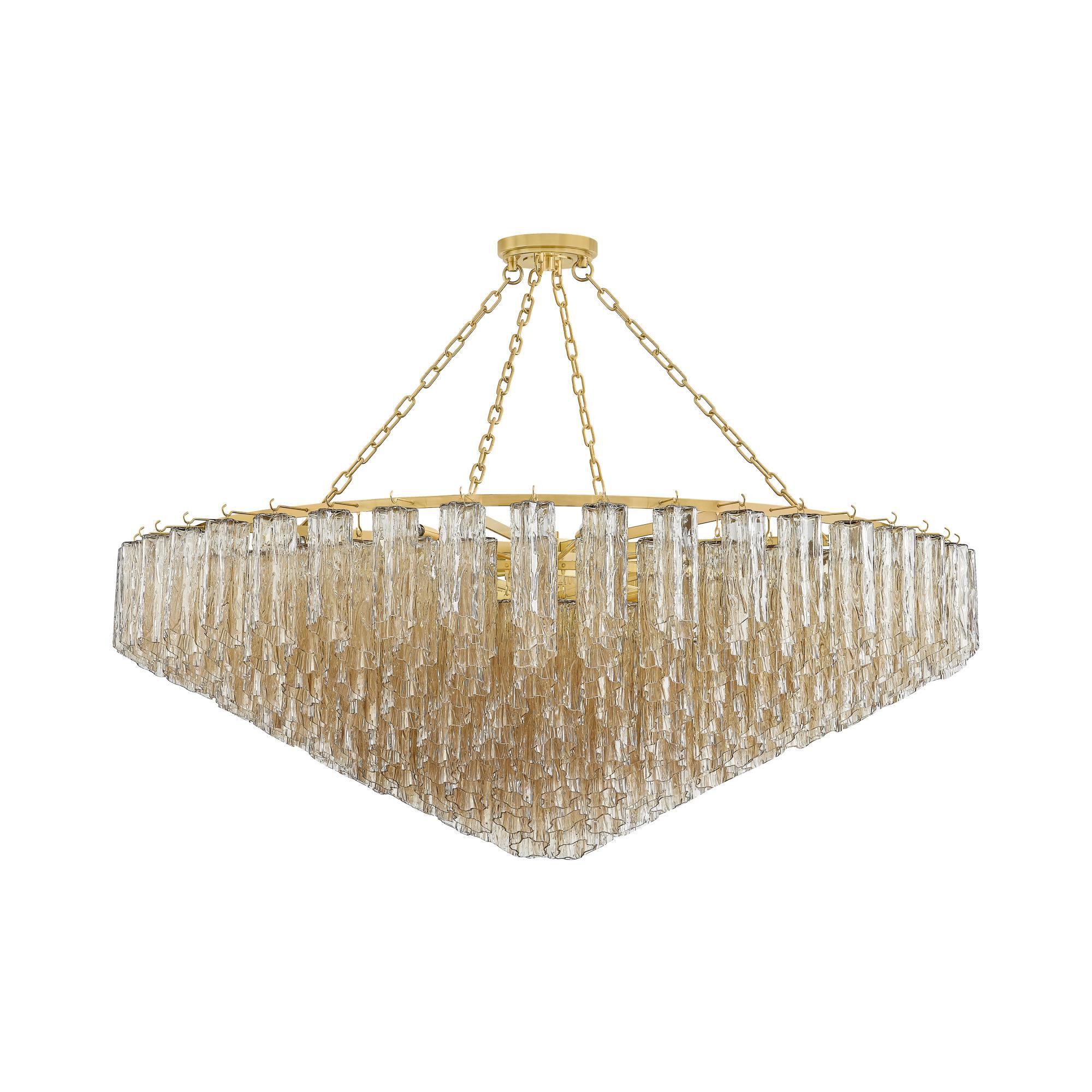 Shown in Aged Brass finish and Tronchi shade