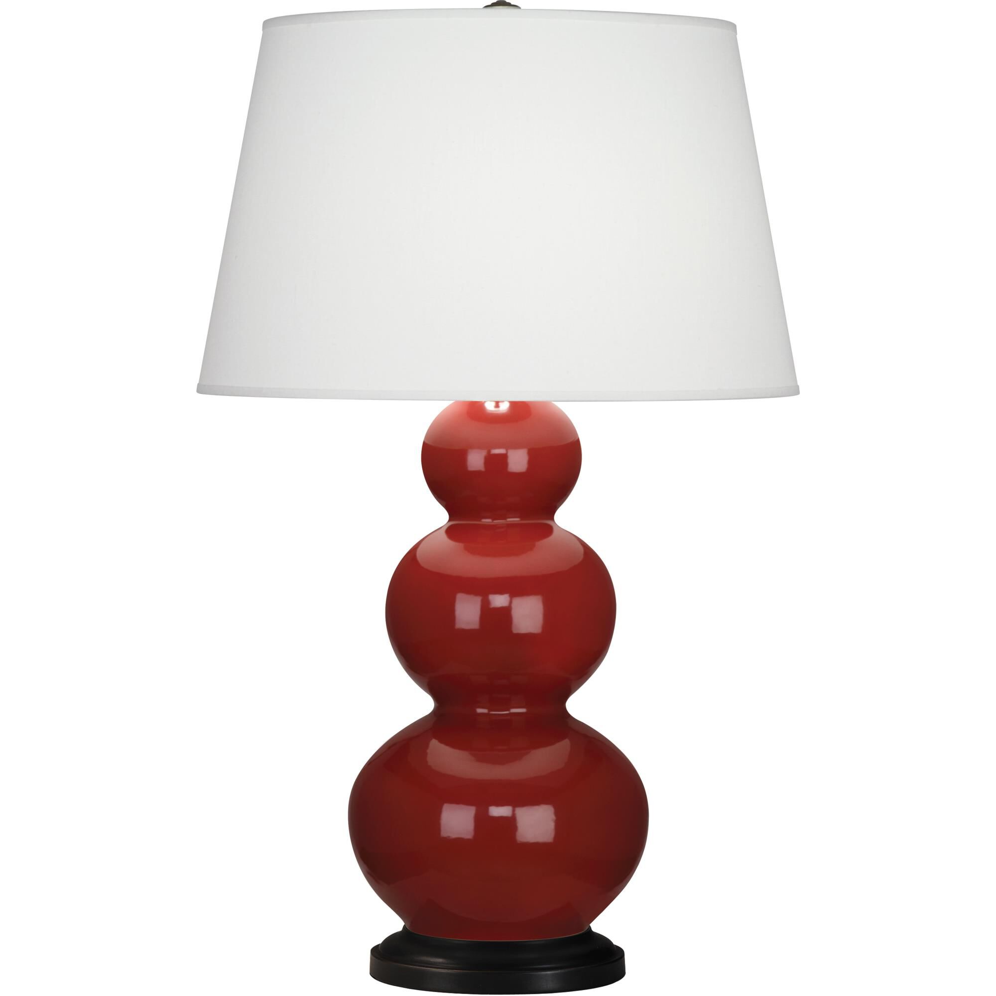 Shown in Oxblood Glazed Ceramic With Deep Patina Bronze ed Accents finish and Pearl Dupioni Fabric shade