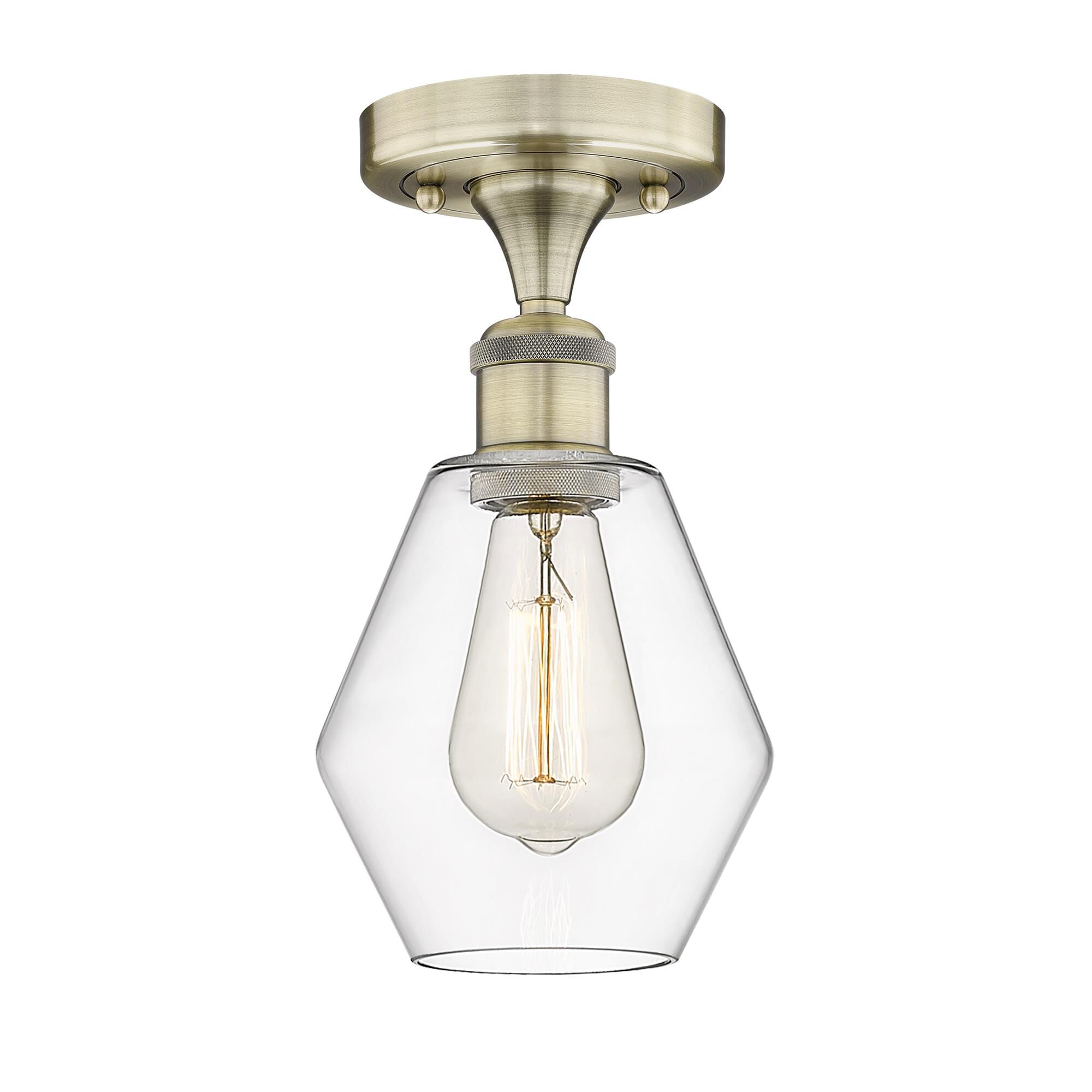 Shown in Antique Brass finish and Clear glass