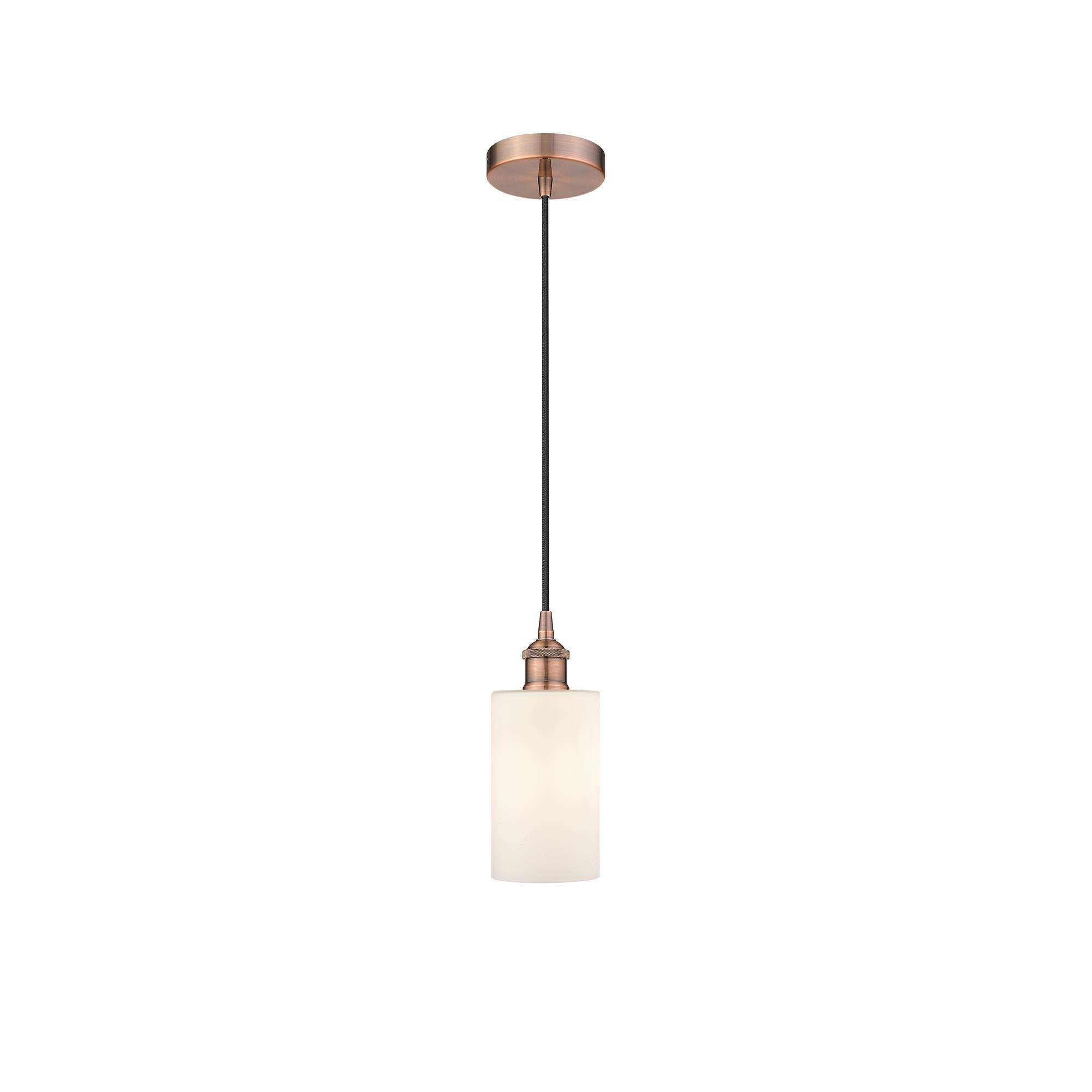 Shown in Antique Copper finish and Matte White glass