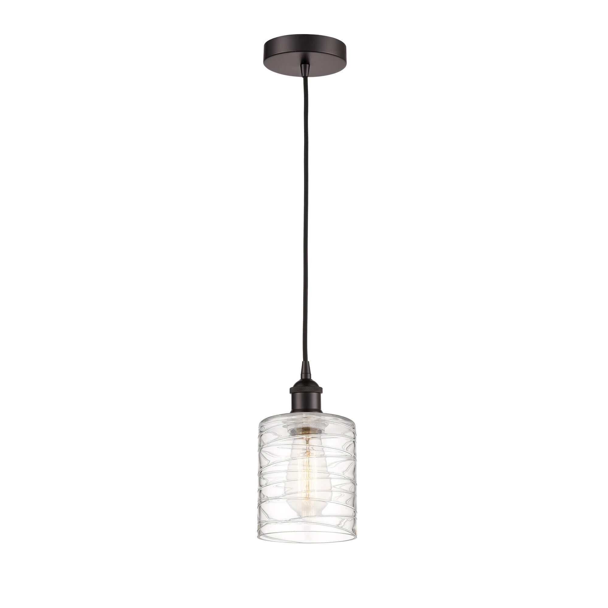 Shown in Oil Rubbed Bronze finish and Deco Swirl glass