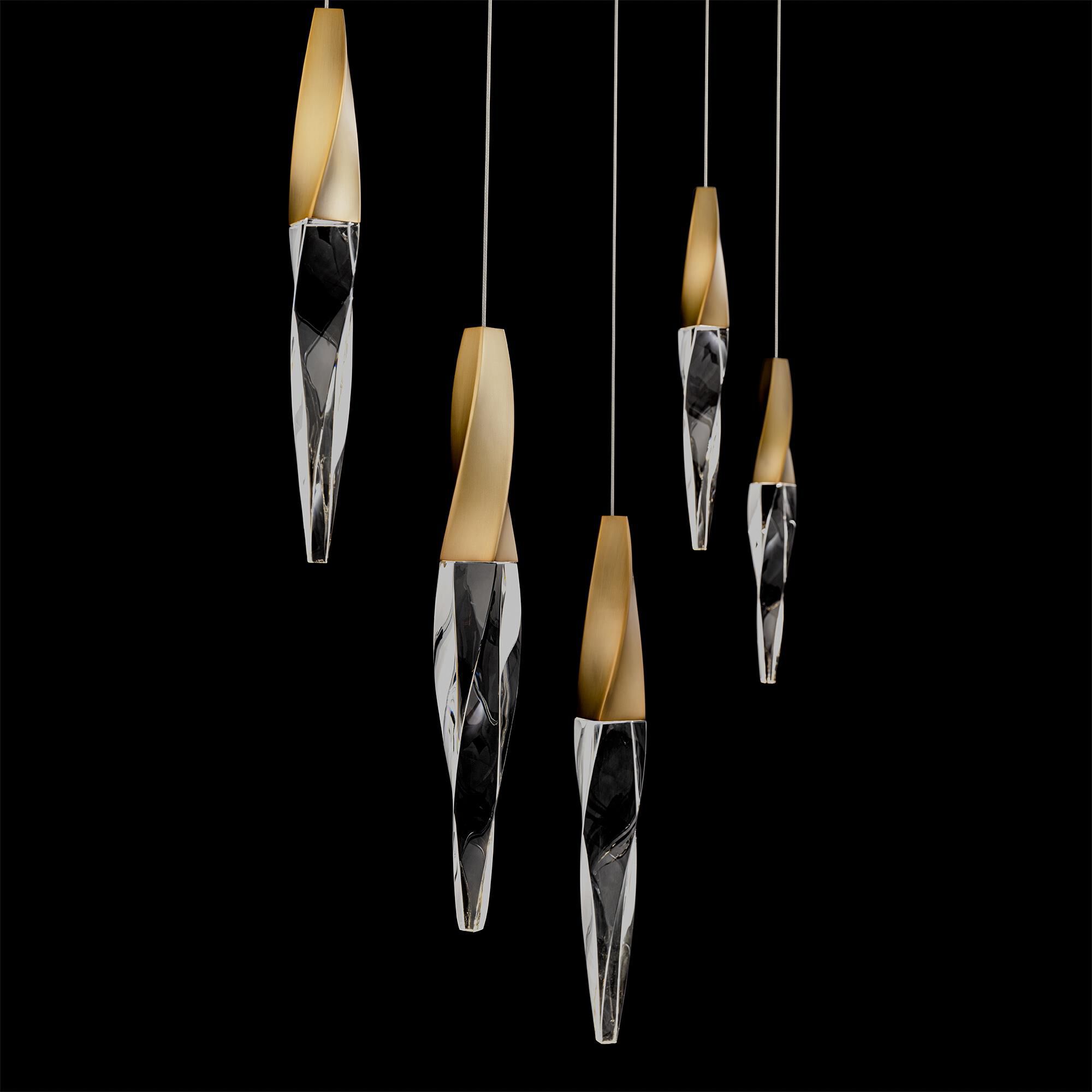 Shown in Aged Brass finish and Optic Crystal crystal