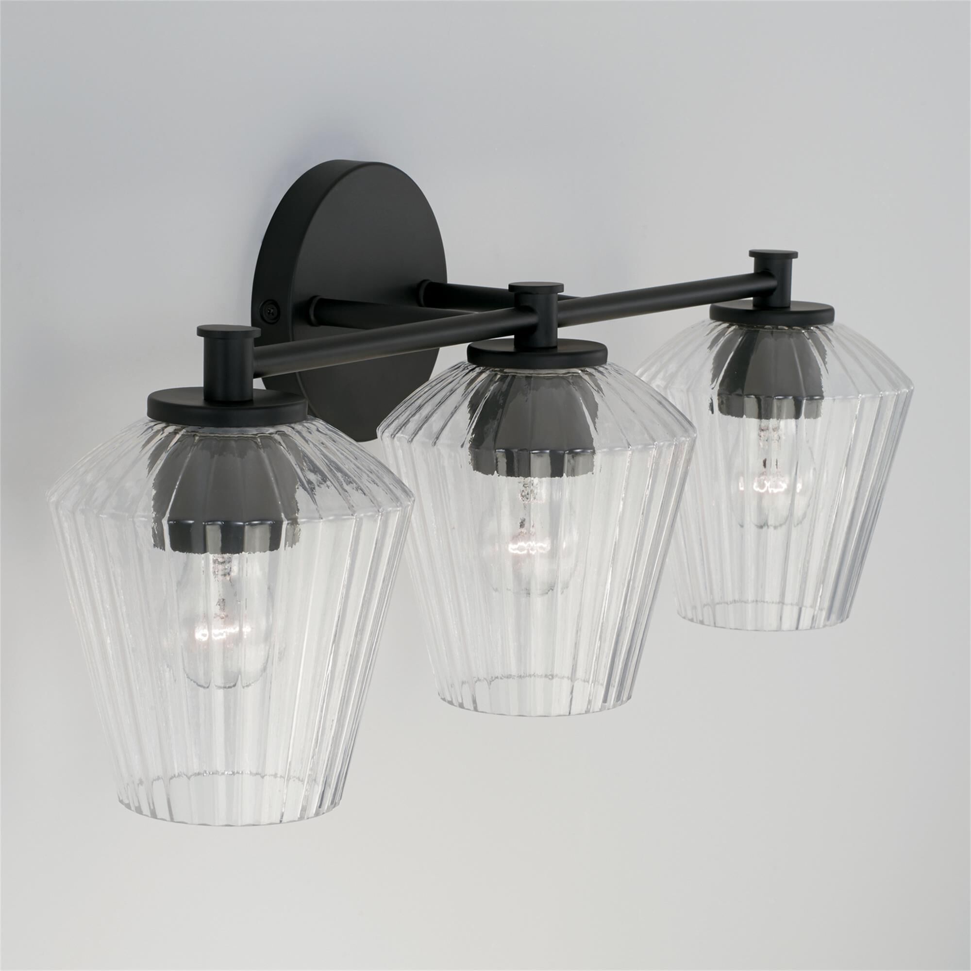 Shown in Matte Black finish and Clear Fluted glass