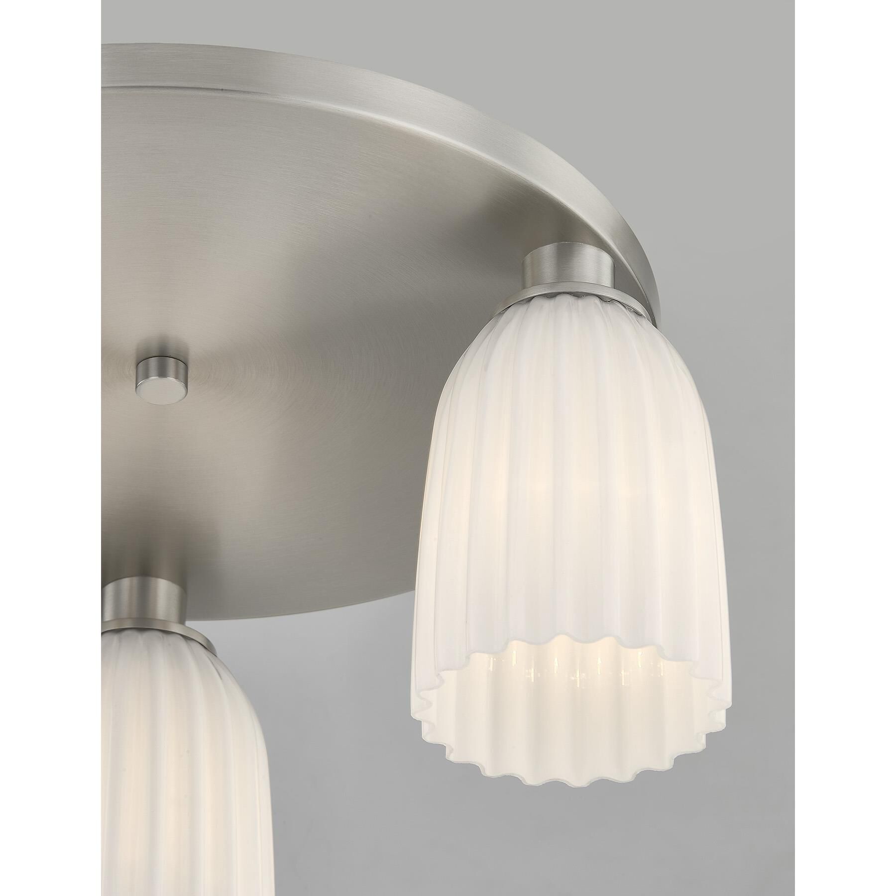 Shown in Satin Nickel finish and White Opal Ribbed glass