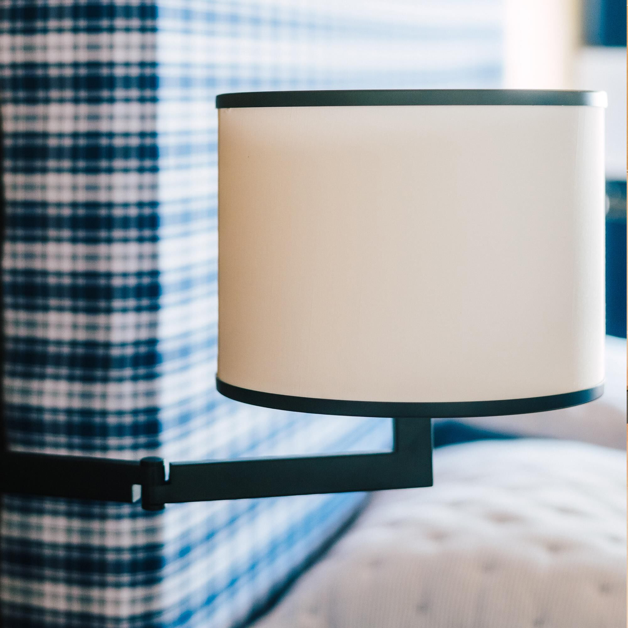 Shown in Matte Black finish and Silk glass and White shade