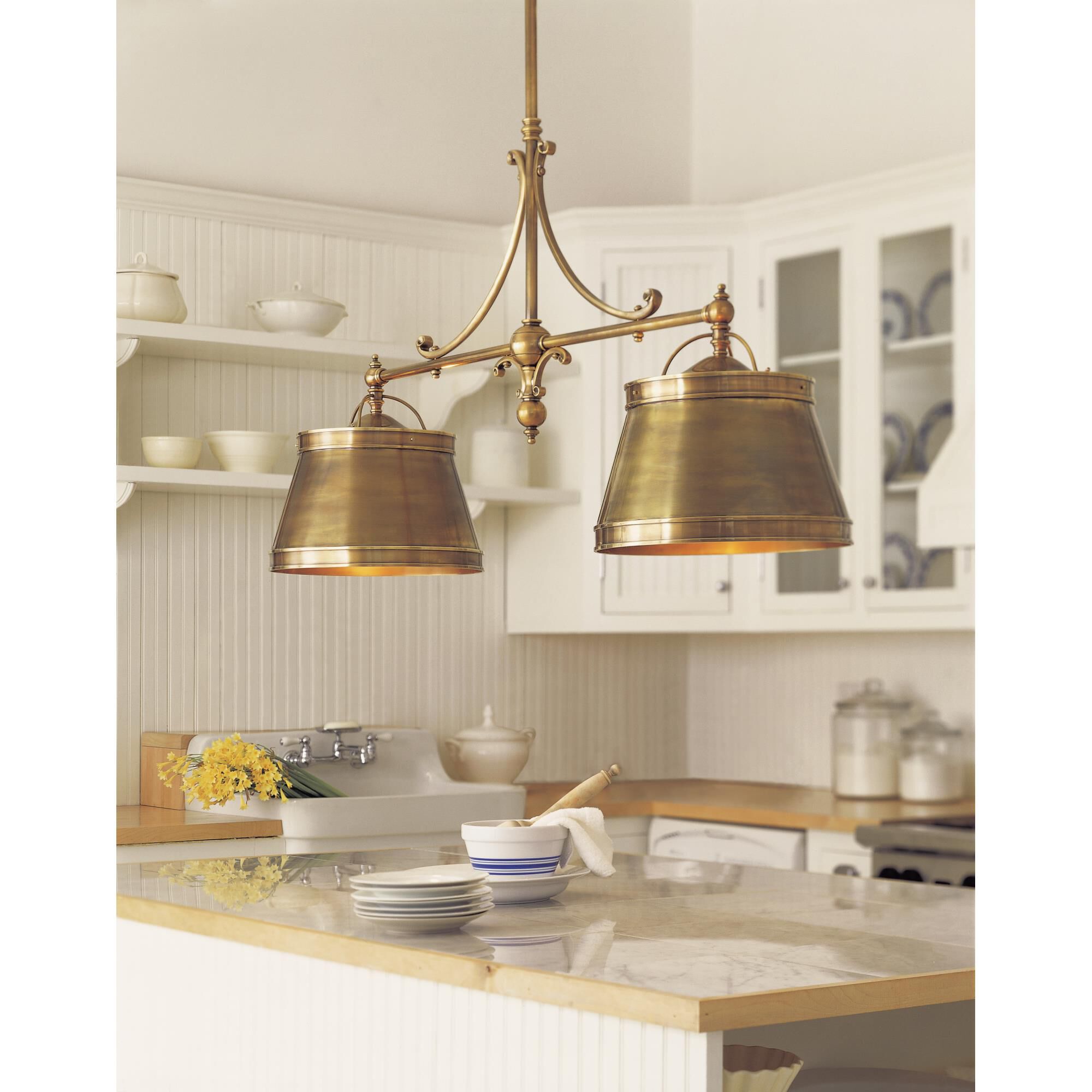 Shown in Antique-Burnished Brass finish and Antique Brass shade
