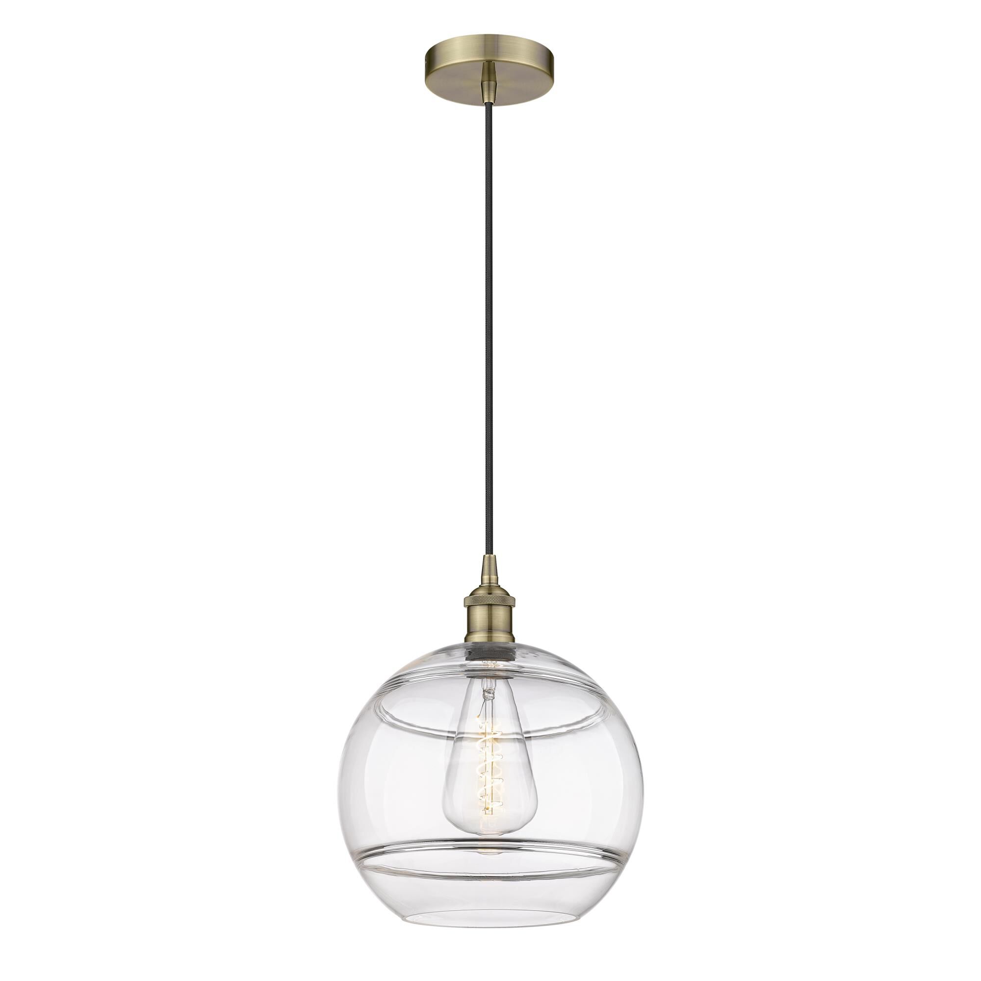 Shown in Antique Brass finish and Clear glass