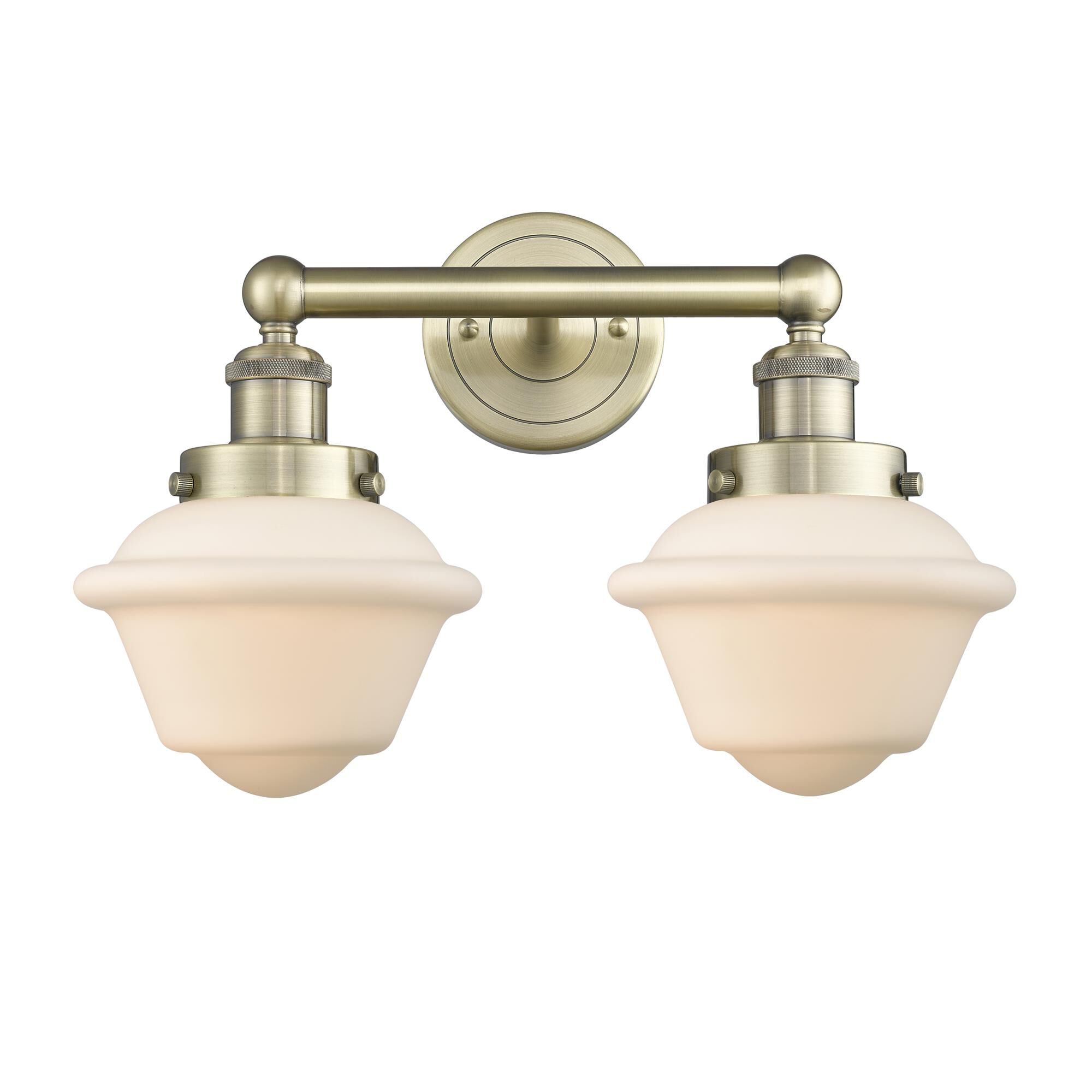 Shown in Antique Brass finish and Matte White glass