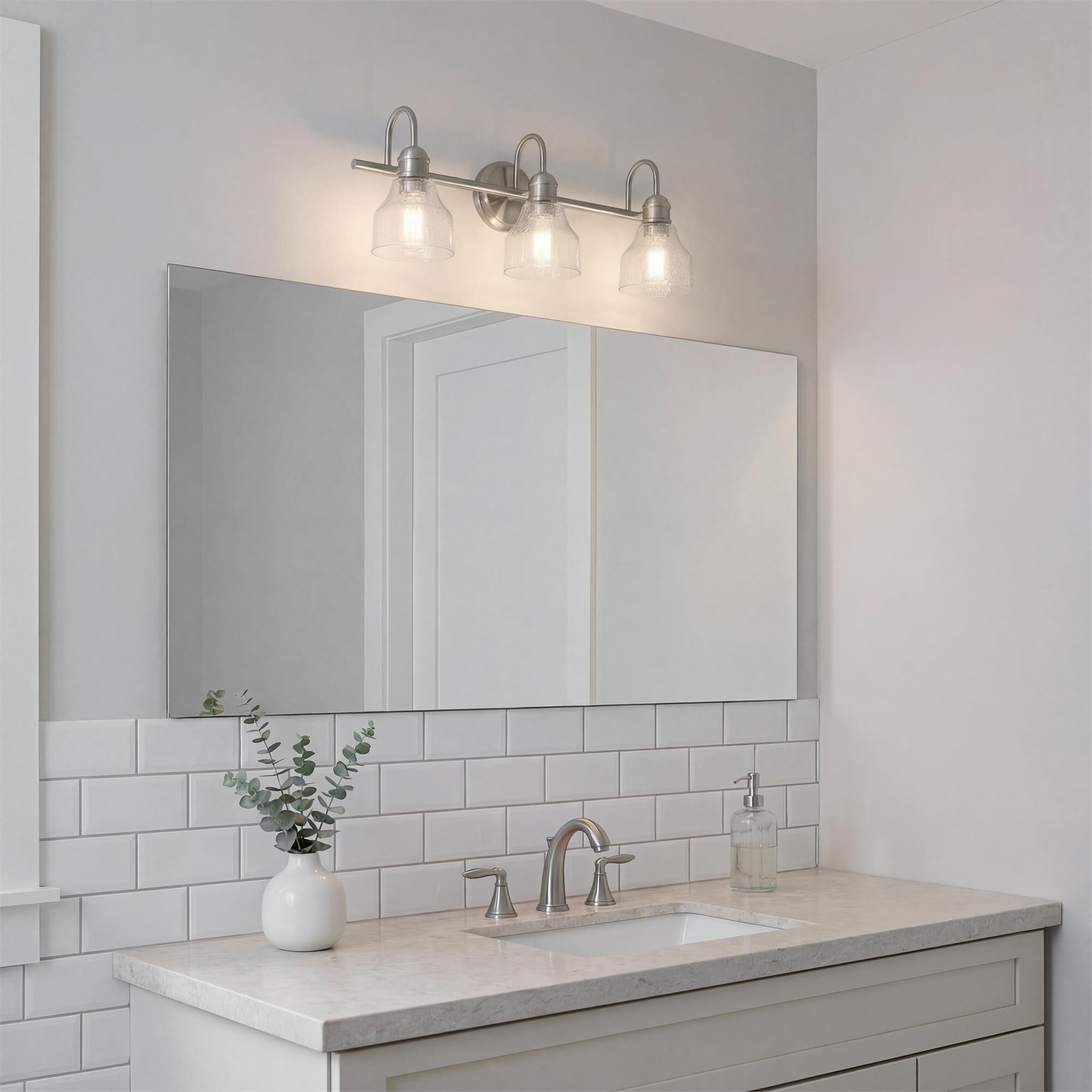 Shown in Brushed Nickel finish and Clear Seeded glass