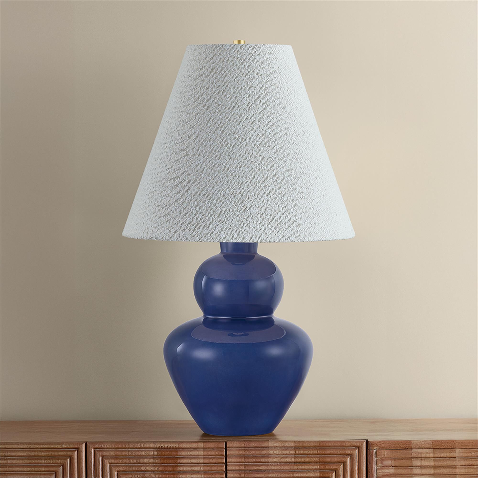 Shown in Aged Brass and Ceramic Egyptian Blue finish and Boucle shade