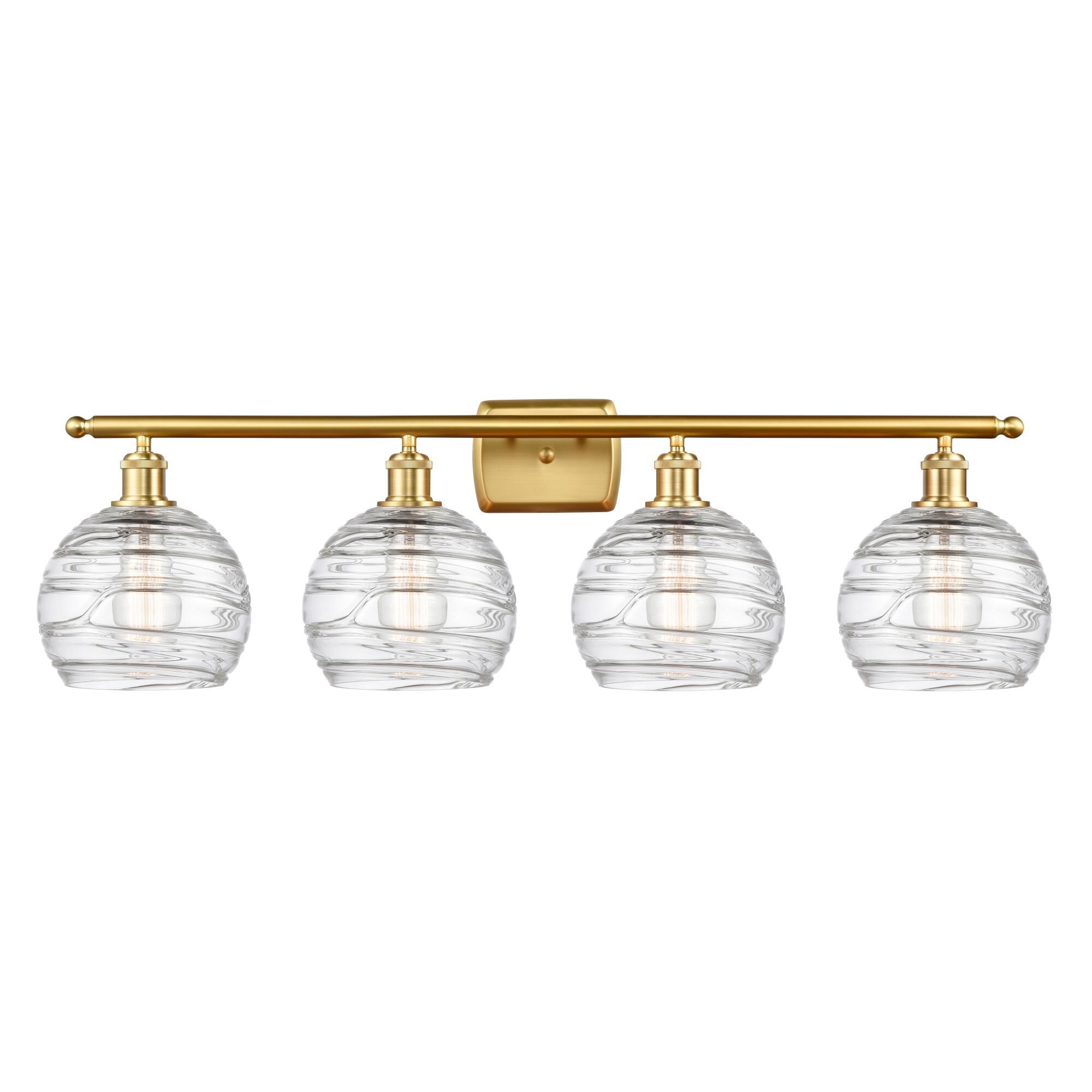 Shown in Satin Gold finish and Clear Deco Swirl glass and Polished Chrome accent