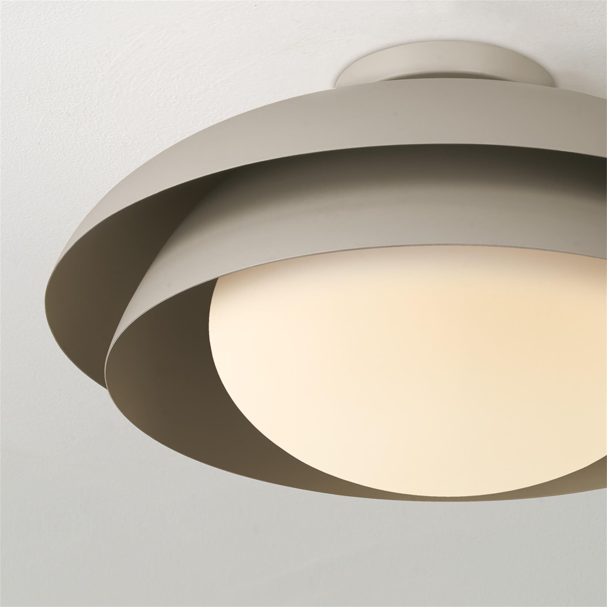 Shown in Taupe finish and Soft White glass and Taupe Metal shade